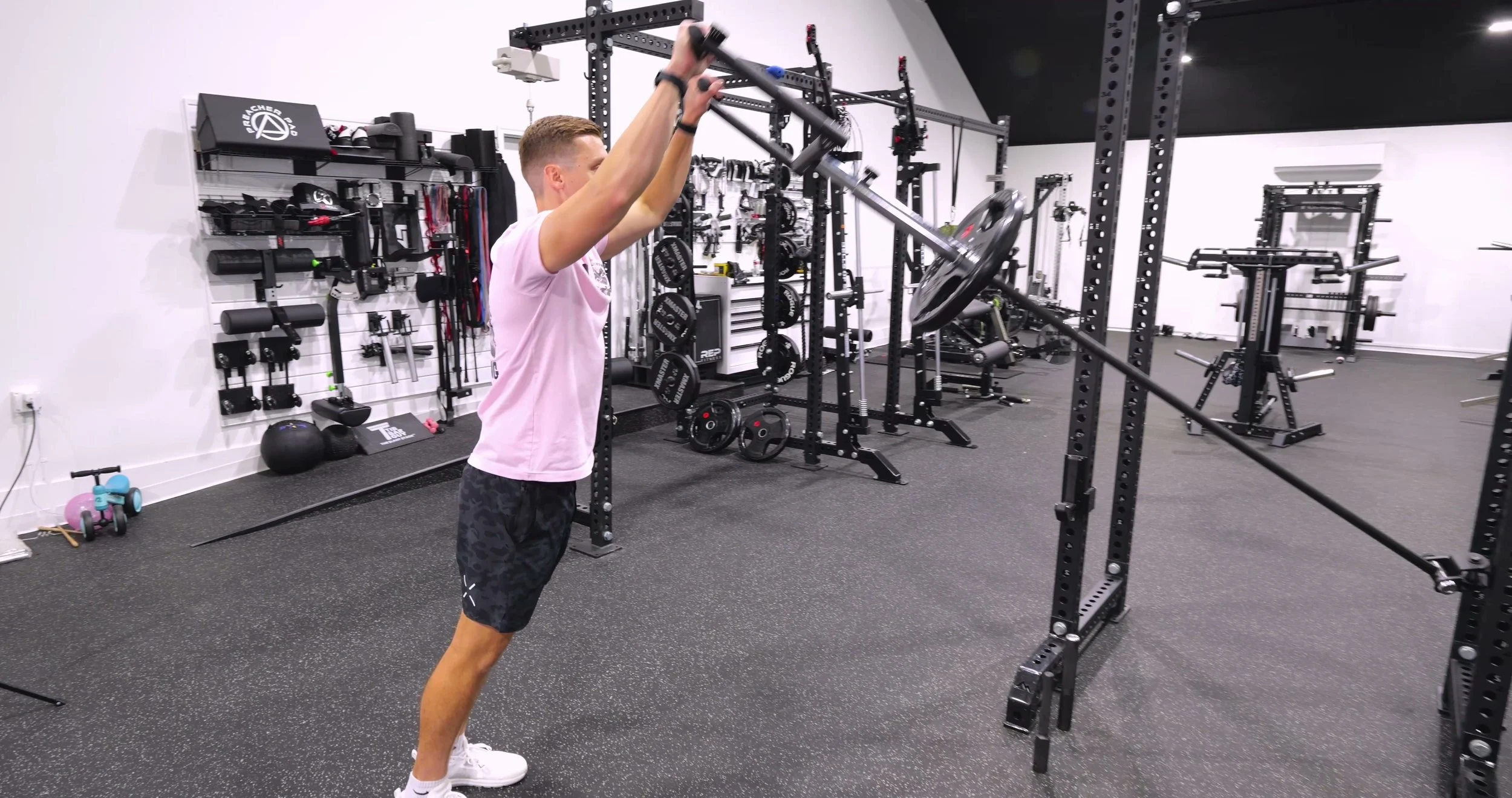 Exponent Edge Viking Raid Adjustable Press attached to the Edge Landmine Bar with dual handles visible