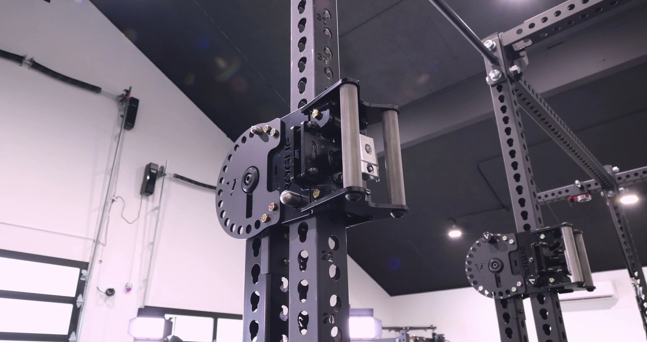 Close-up of the trigger mechanism and acetal rollers on the Rogue Lever Arm trolley bracket