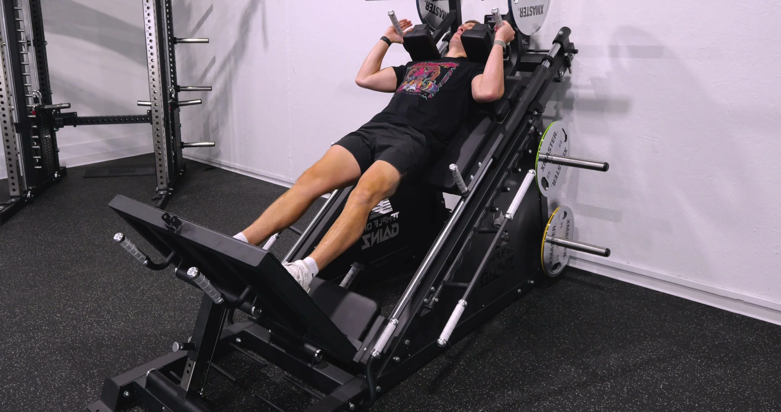 Michael using the Quadsend in hack squat mode