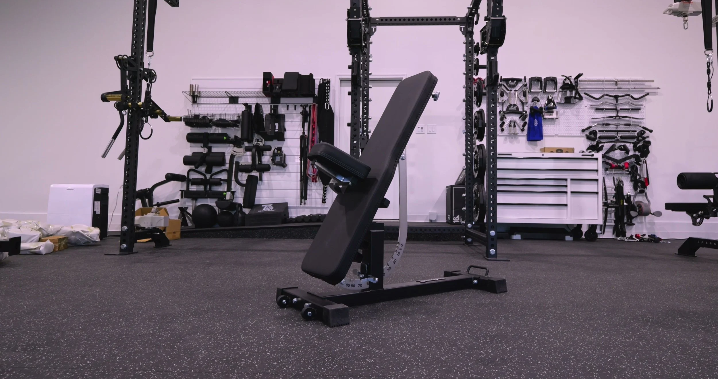 Ironmaster Super Bench Pro V2 adjustable bench in a home gym