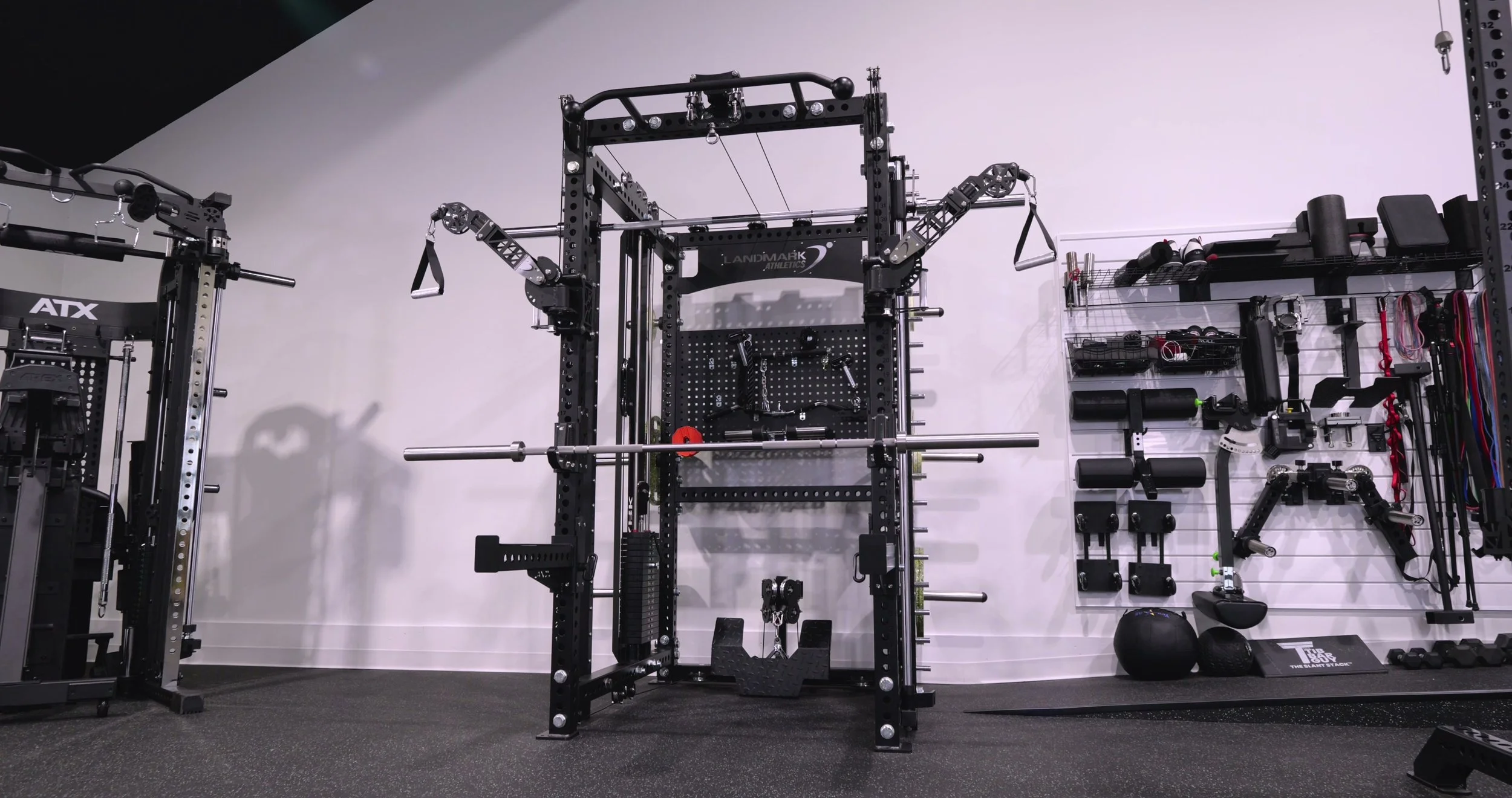 The Landmark Everest All-in-One Home Gym fully assembled with articulating arms and weight stacks