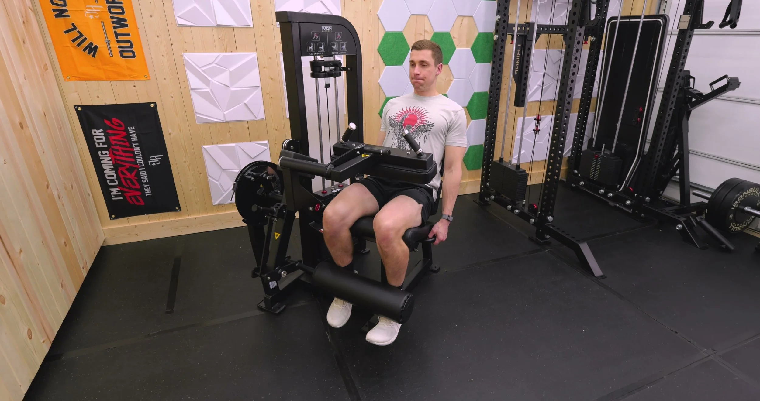 Leg extension start depth selector showing three range of motion positions