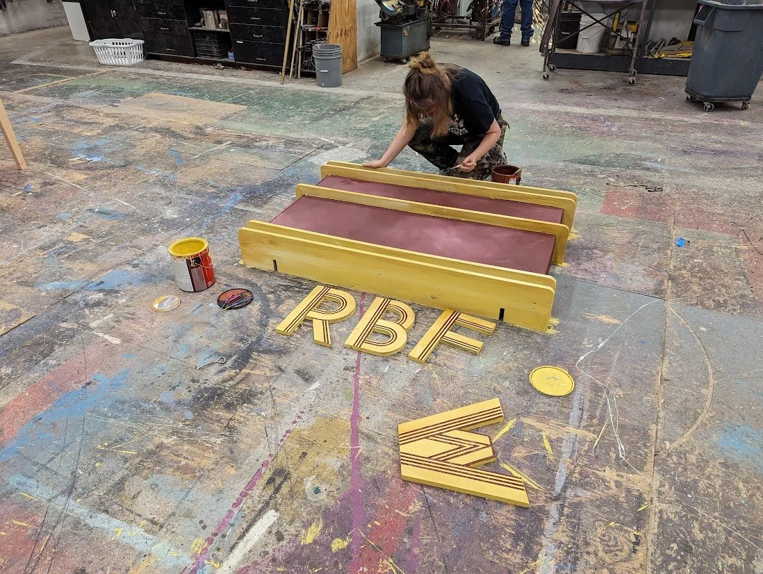 Layout and painting of the sign