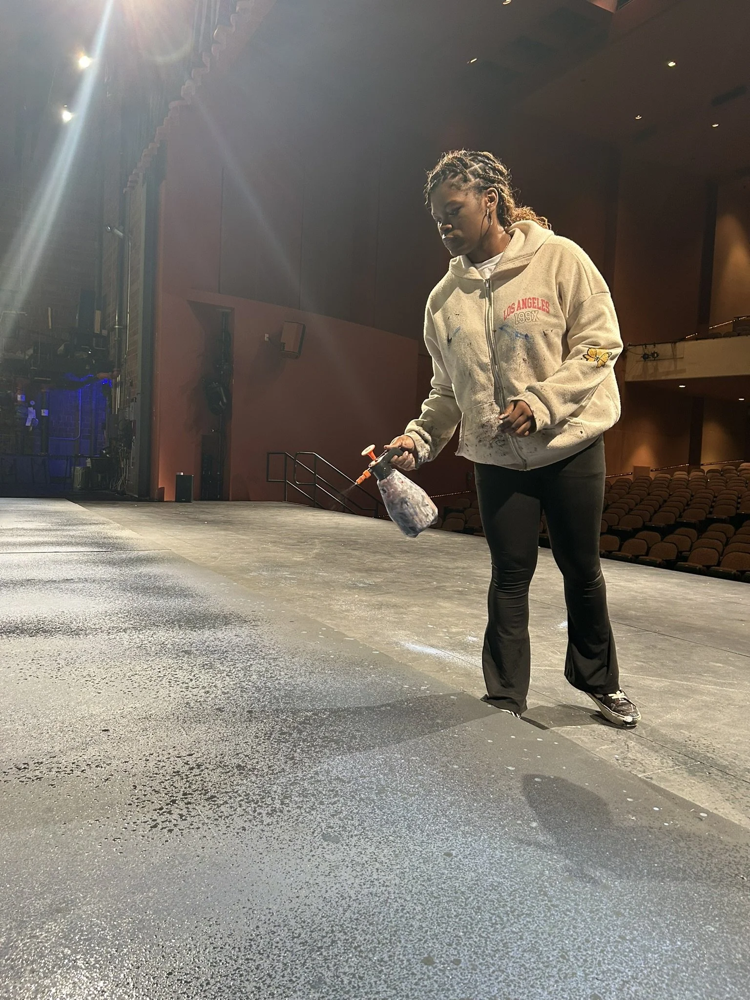 Charge Artist Ja Na' Ya working on the mountains