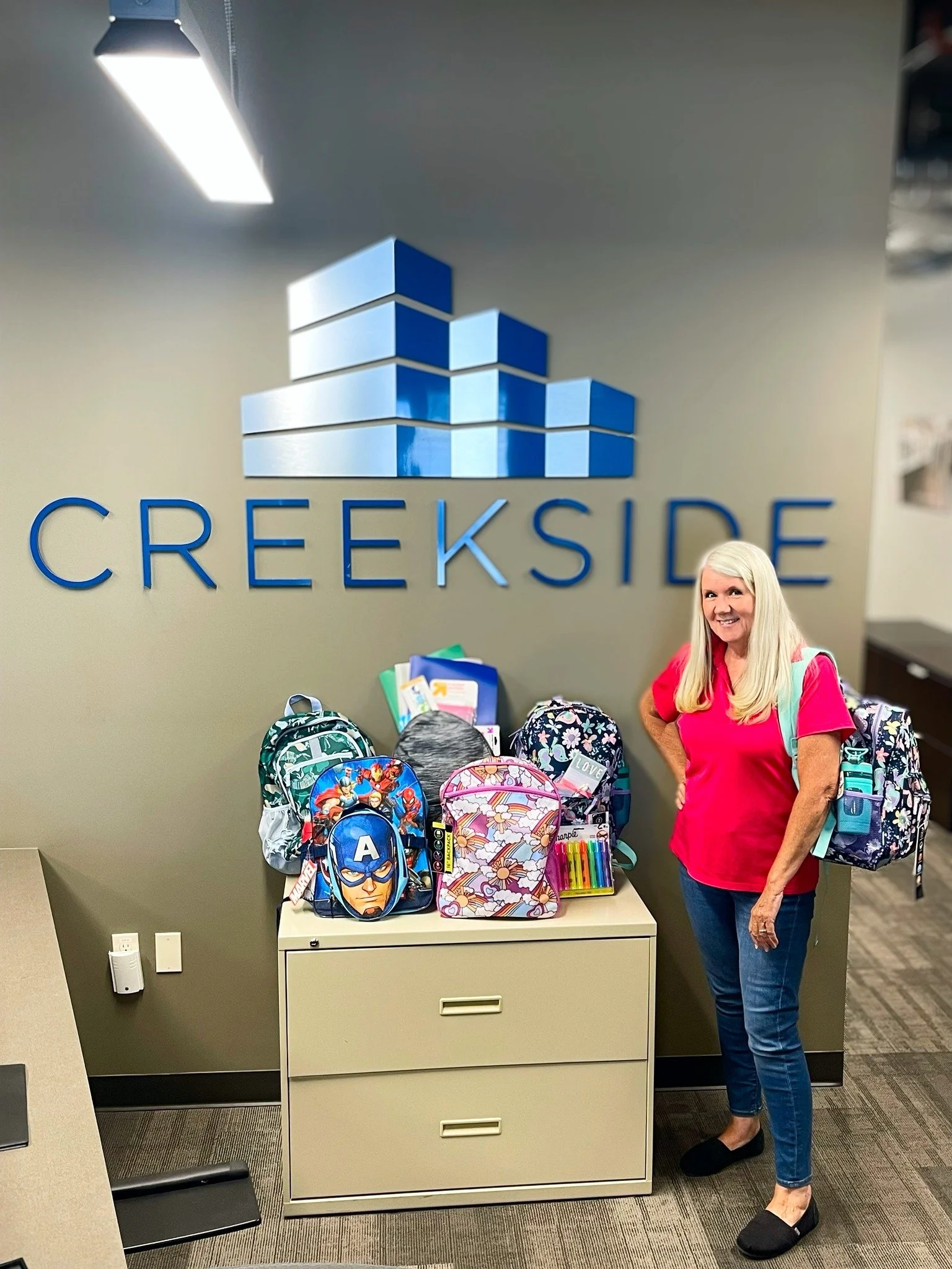 Debbie and Backpacks.jpg