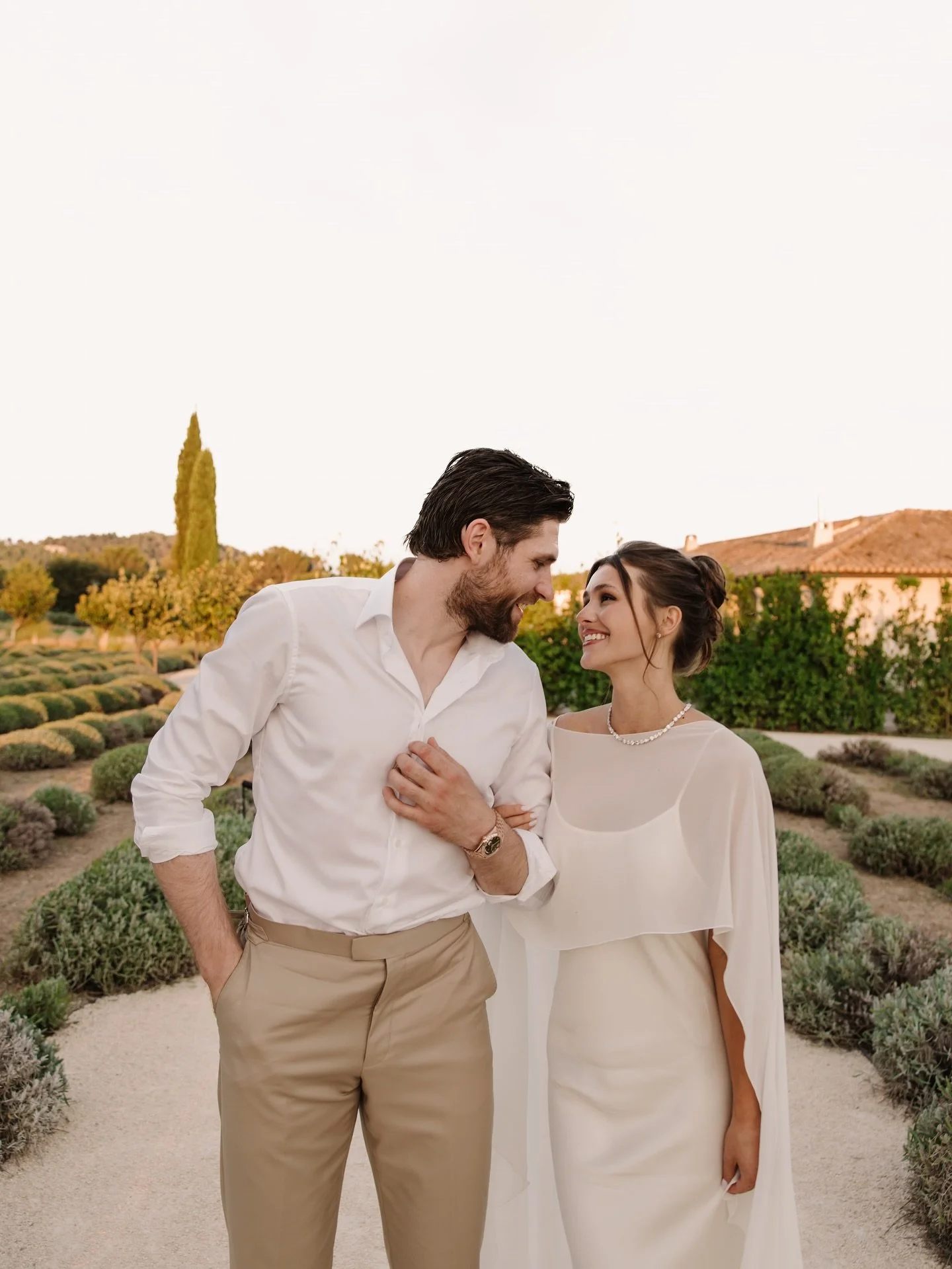 Family and and friends of @celestedesjardins and @drat_29 gathered the night before for an intimate dinner in the lavender field to celebrate their love.

Celeste wore a @victoriabeckham slip, custom cape by @rimearodaky, and a stunning multi shape d