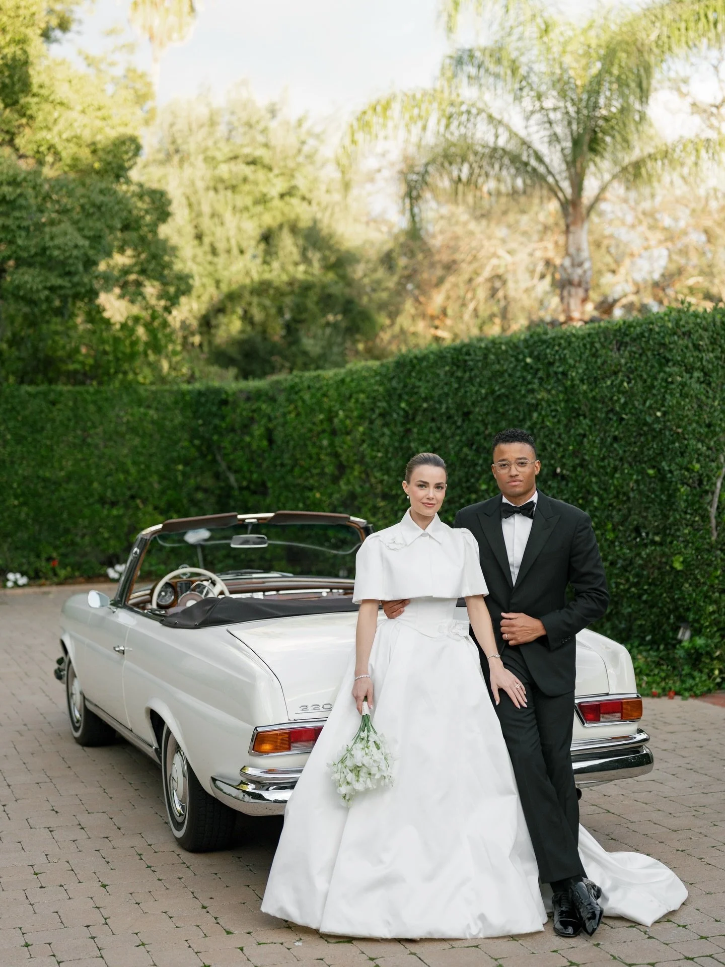 Mr. &amp; Mrs. Robiskie ✨

@rebeccarittenhouse is a modern day Grace Kelly in her @markingramcollection gown and caplet. 

After five full days of bridal market and endlessly fun appointments, we found the perfect dress that felt so perfectly Rebecca