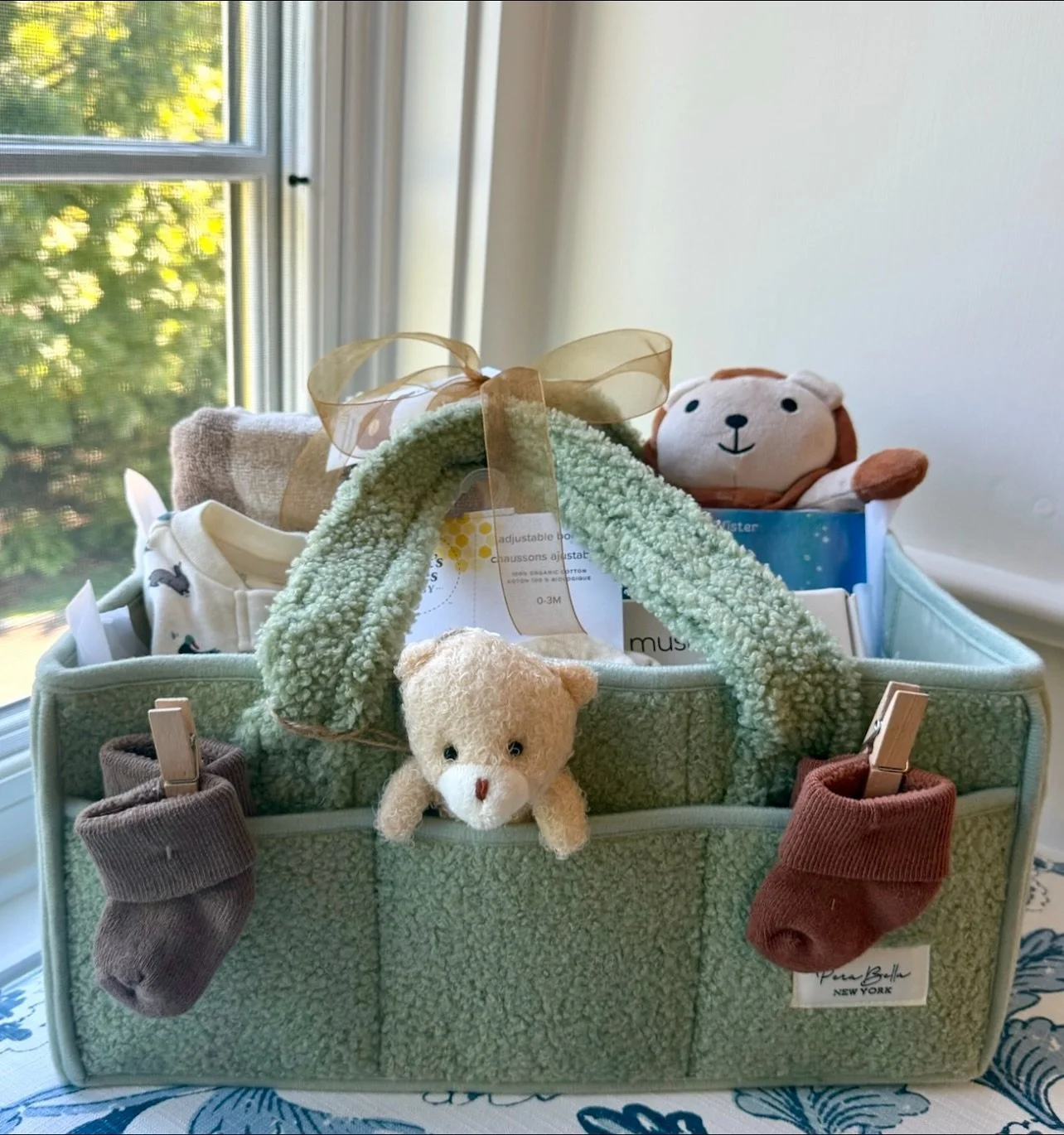 swapped a basket for a diaper bag to create this adorable (and functional) baby gift! 🐣