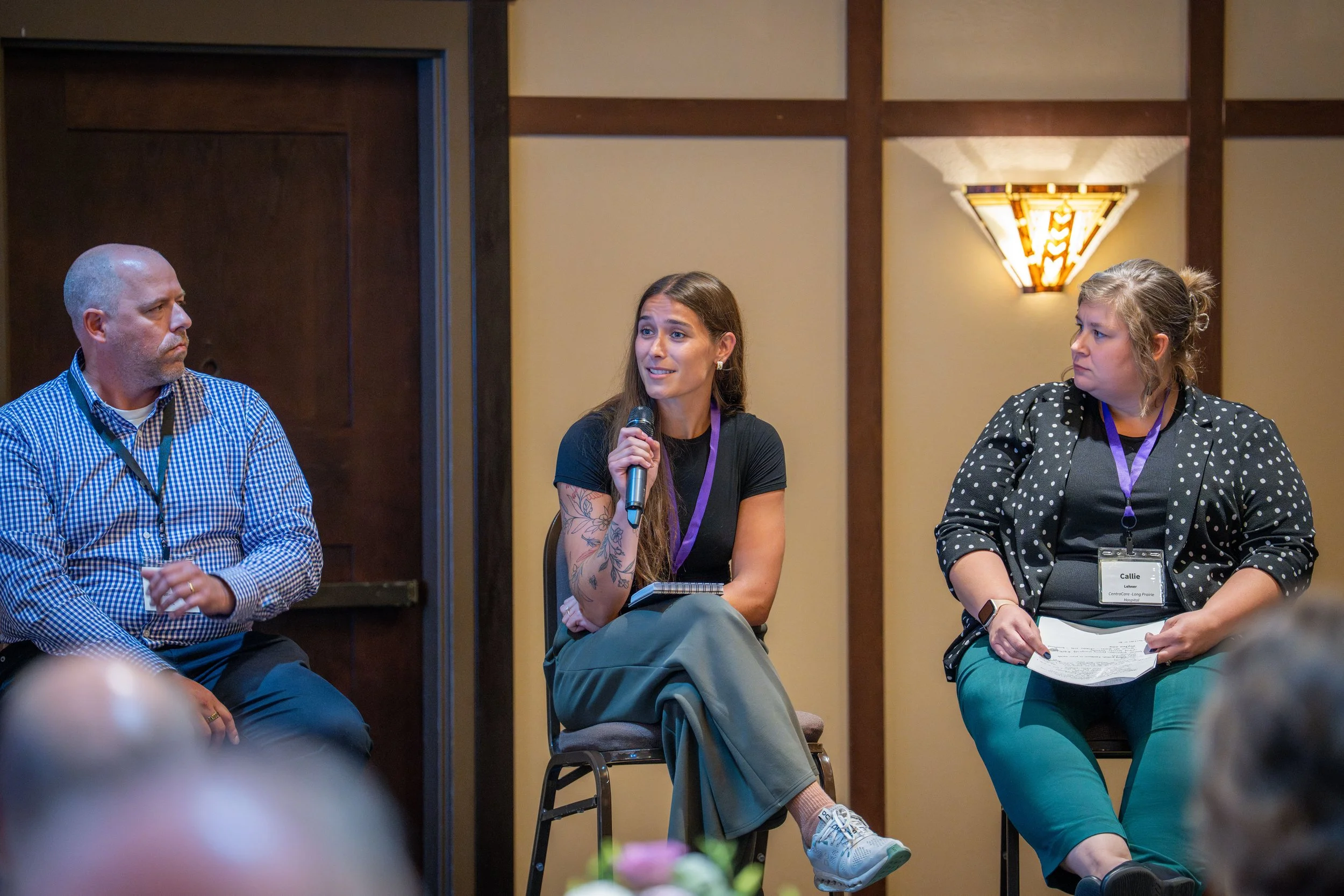Three people on a panel