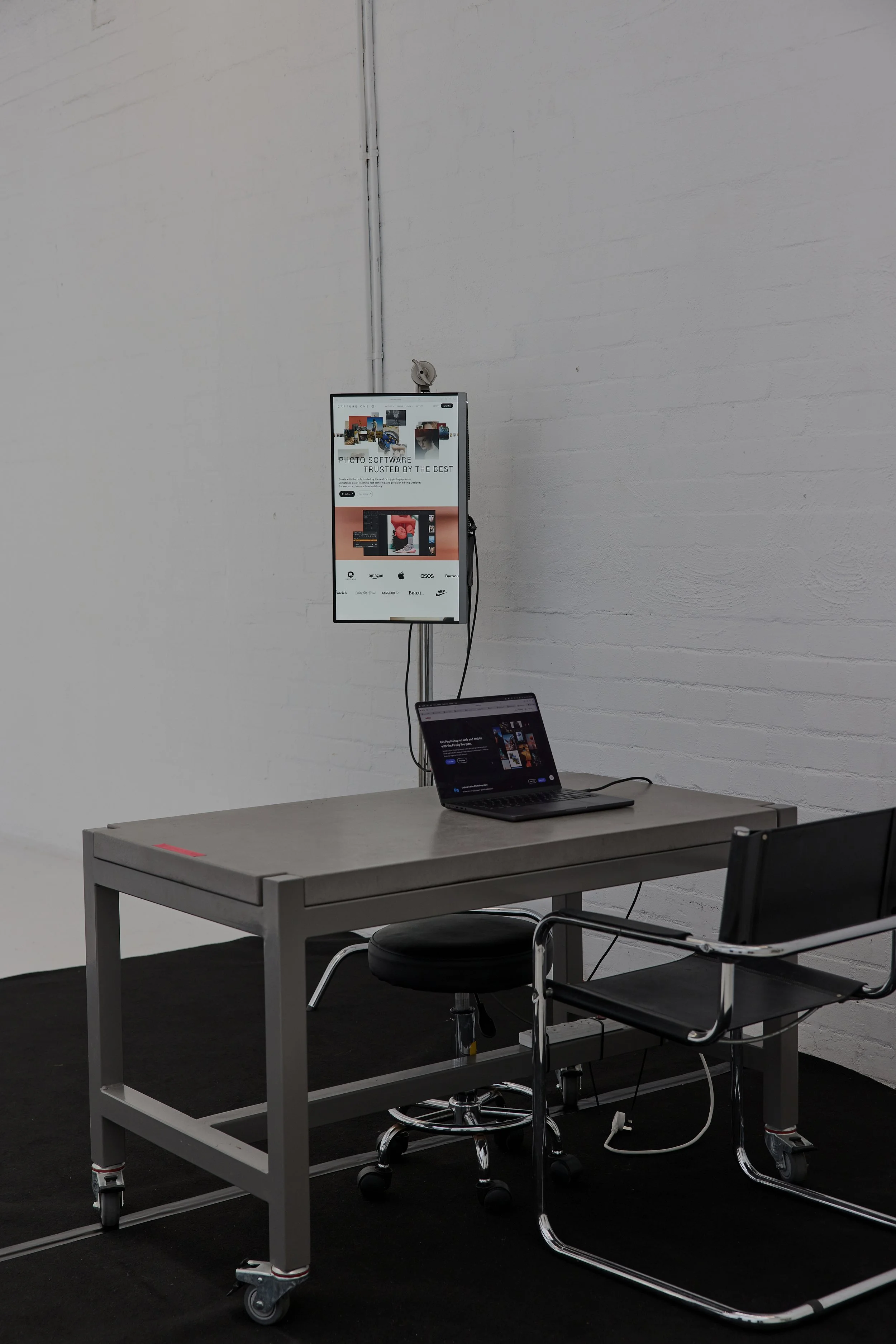 Concrete topped photography work station and monitor.