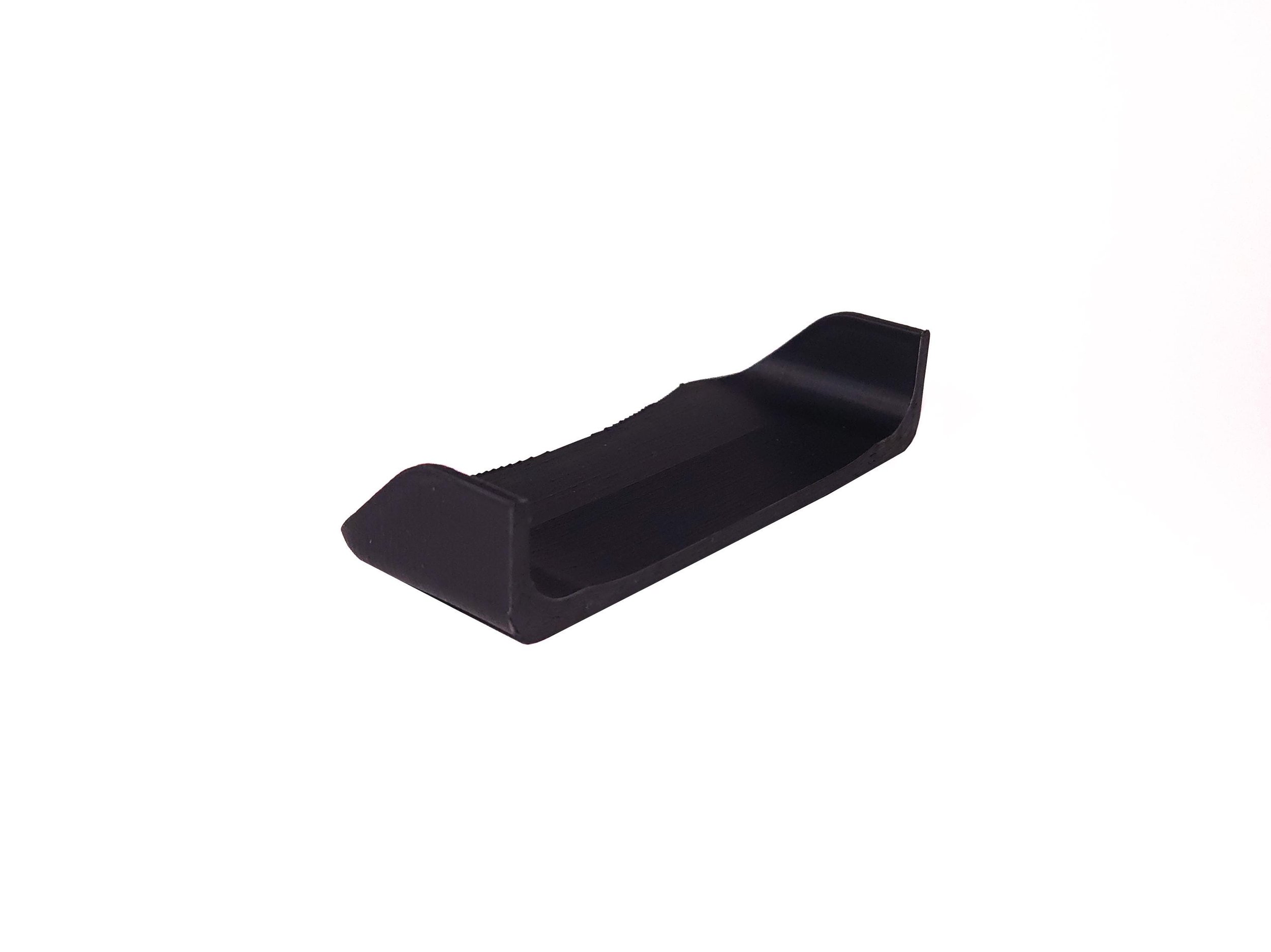 Black plastic clip or bracket with a curved shape, isolated on a white background.
