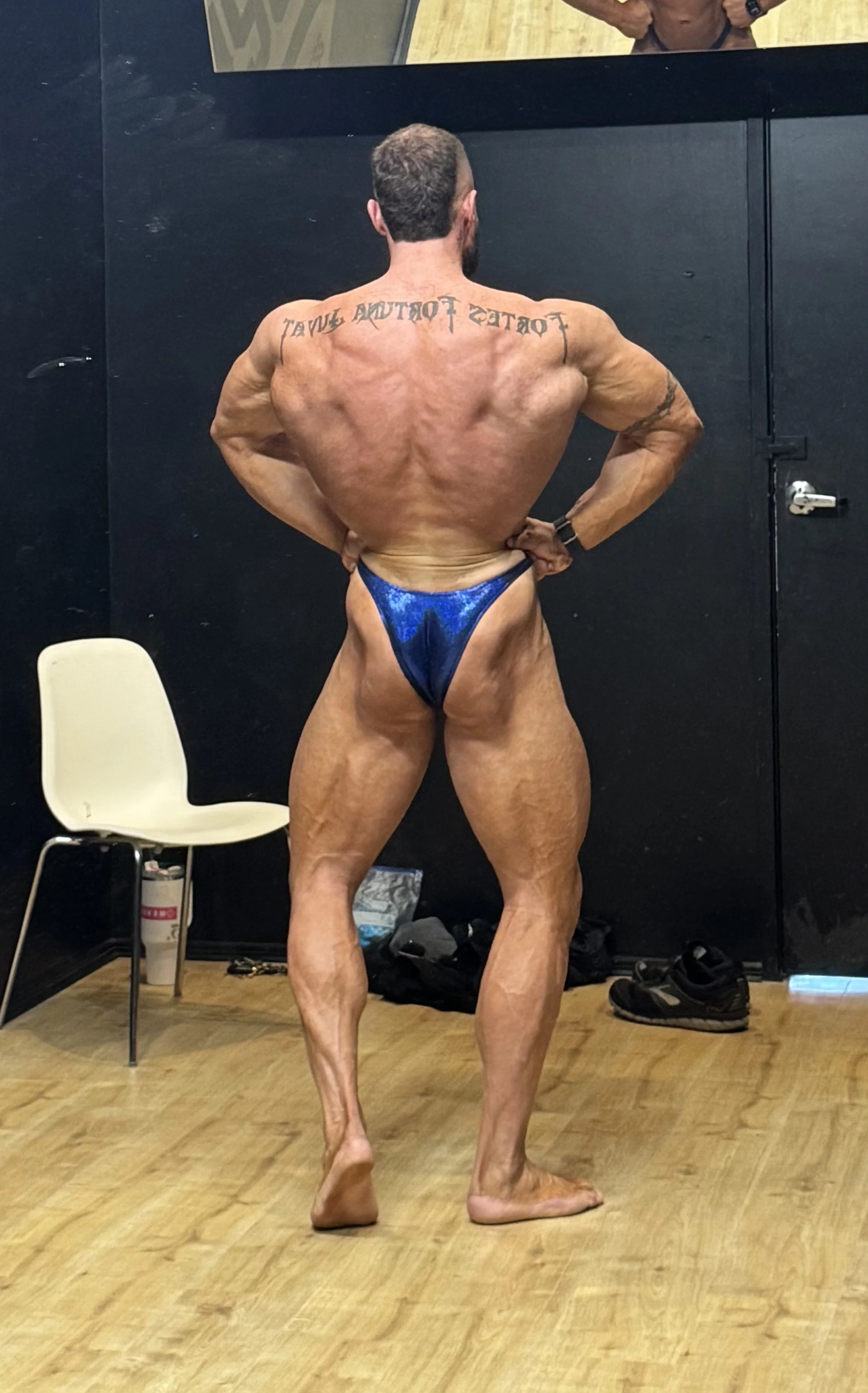 2025 Season A IFBB Pro League winner Bryce Storie posing young body builder