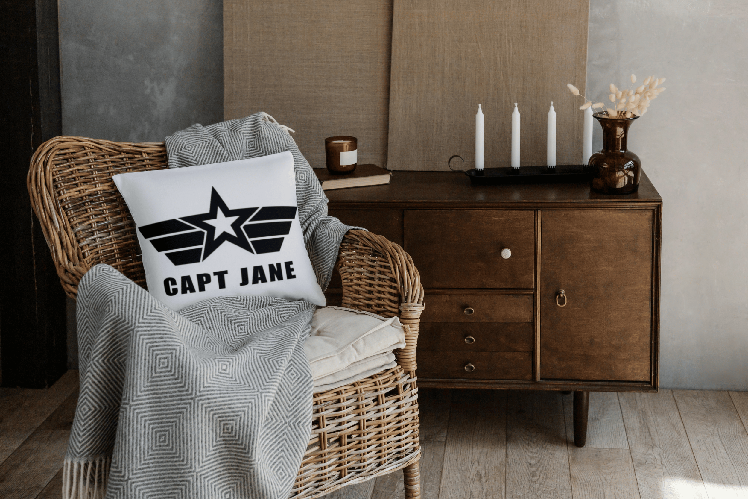A Pillow proudly displaying the CAPT JANE logo.