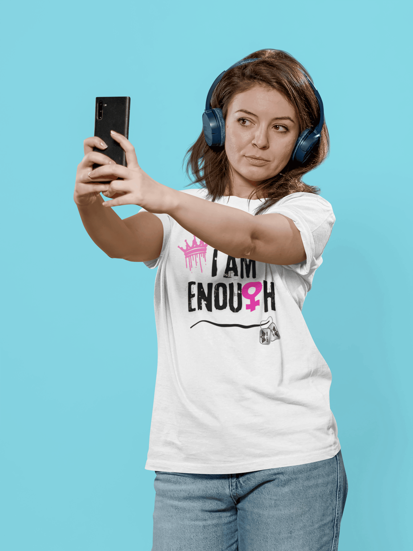 t-shirt-mockup-of-a-woman-with-headphones-taking-a-selfie-in-a-studio-m25902-r-el2.png