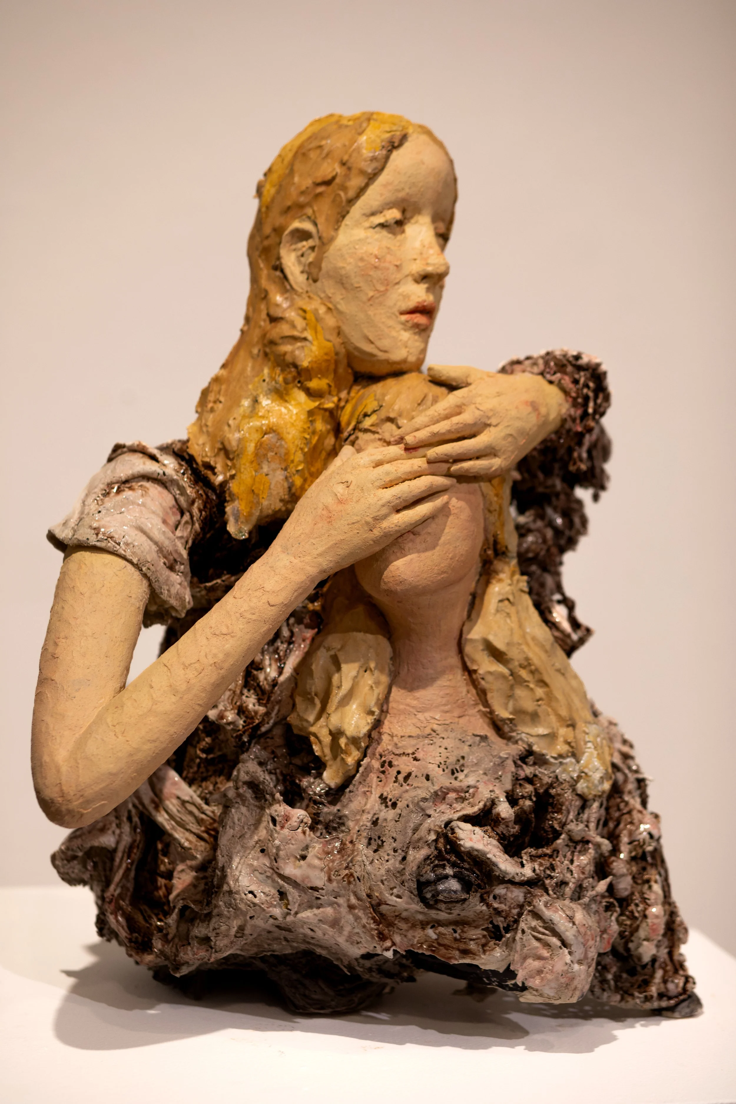 Here-but same time- In her arms
