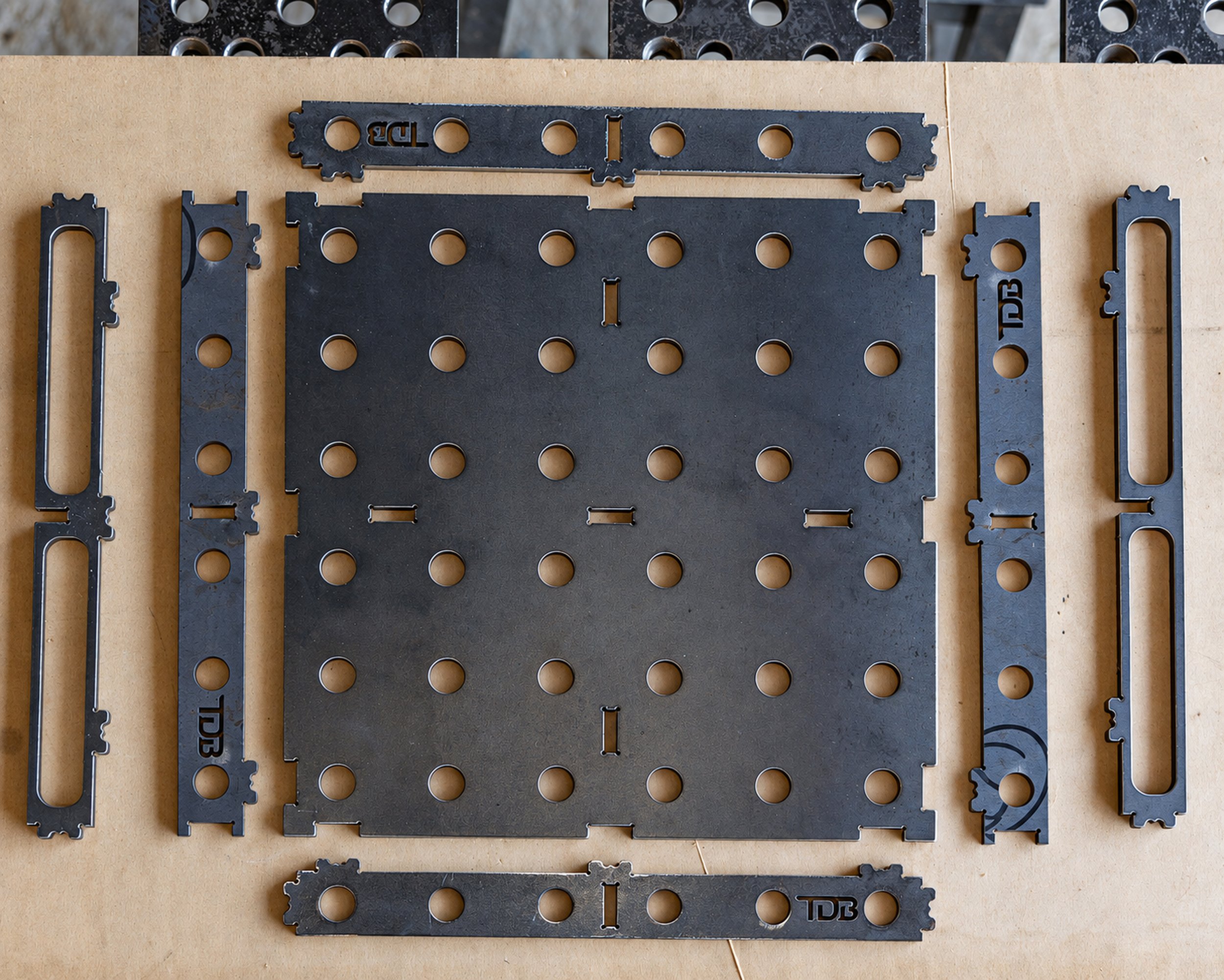 Flat-packed laser-cut parts for the TDB Fab 300 × 300 mm welding table top