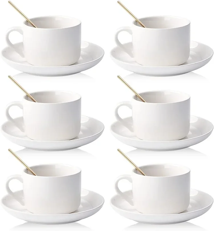 Crockery Sets: White Tea Cups, White Saucers & Gold Tea Spoons. £3.50 + VAT per set