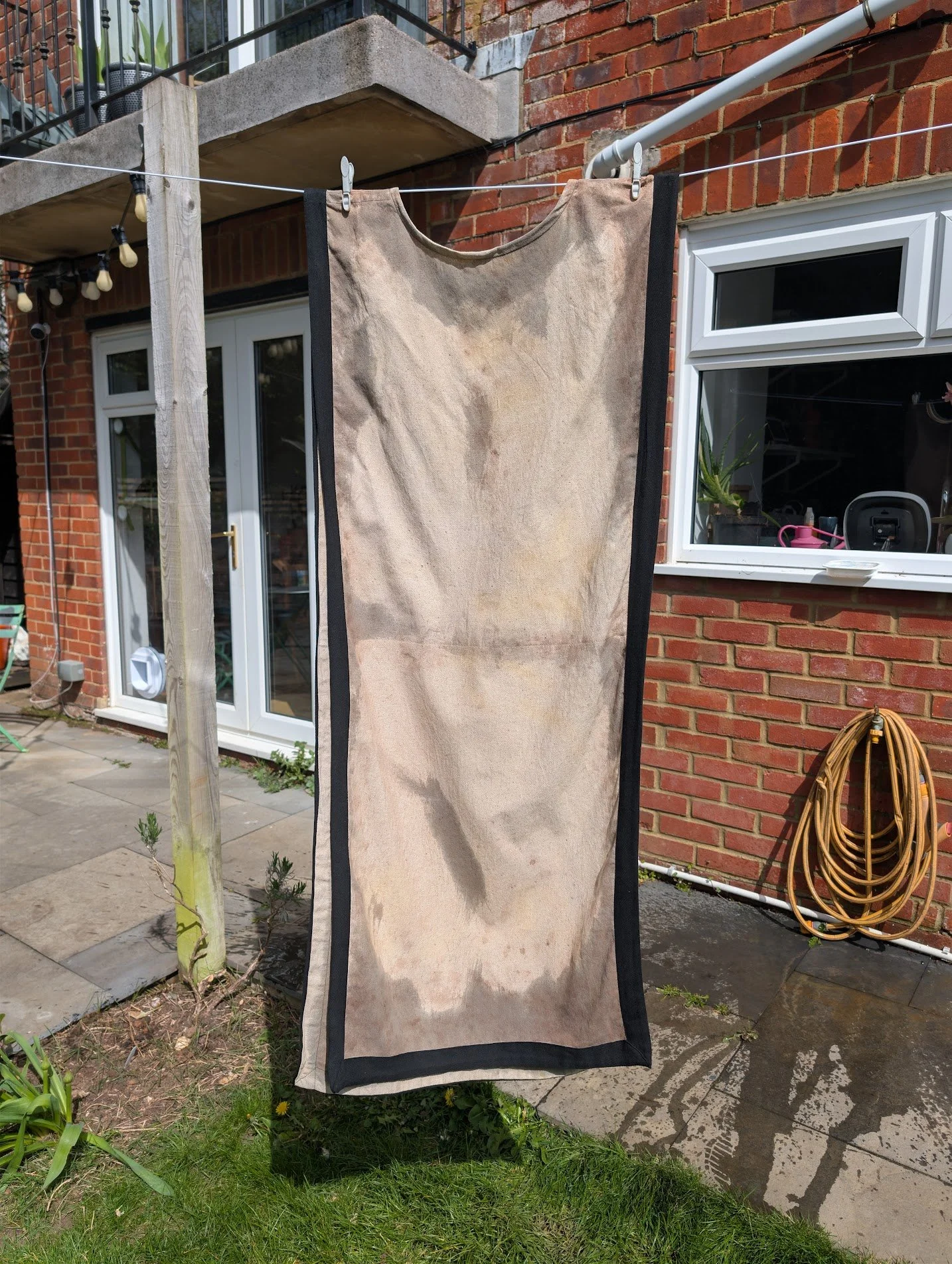 Weathering the homemade surcoat in daylight