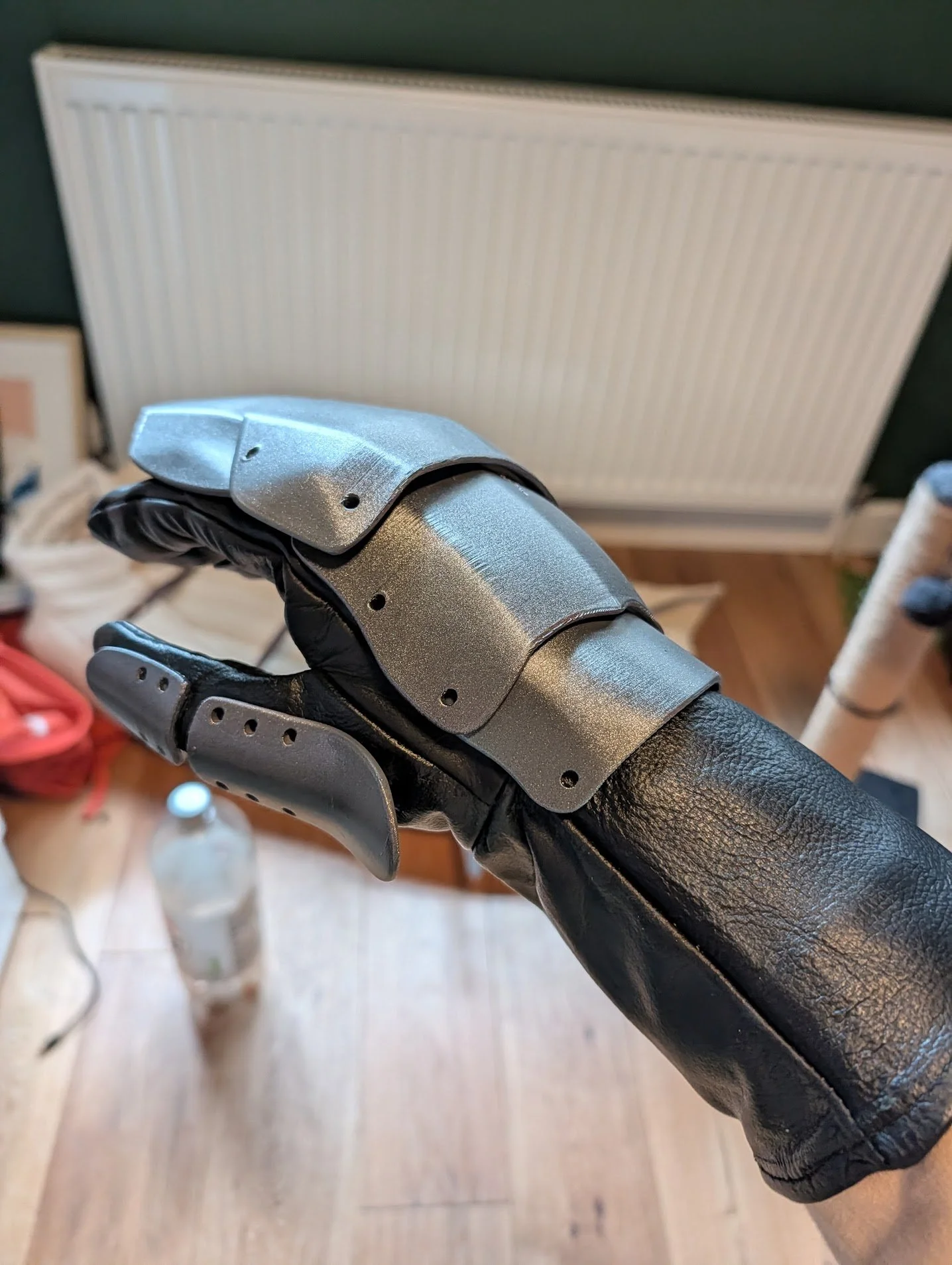 Gauntlet with full range of motion assembled onto glove