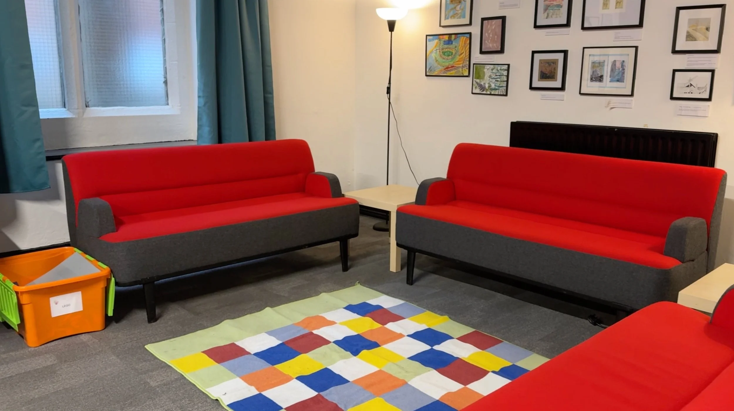 Sofas and play space for parents and carers of under 5s