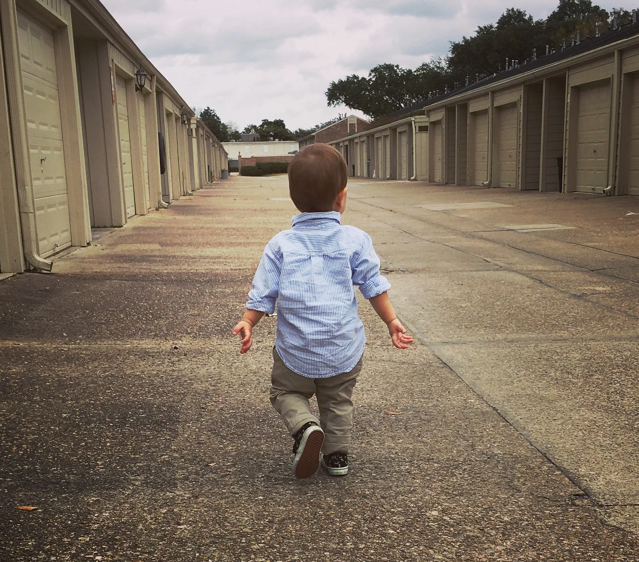 houston-walk-child-financial-plan-carport-boy-walking-after-houston-hurricane