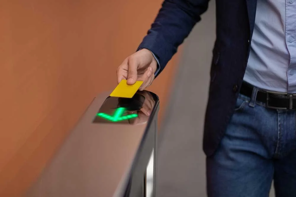 man scanning his access fob