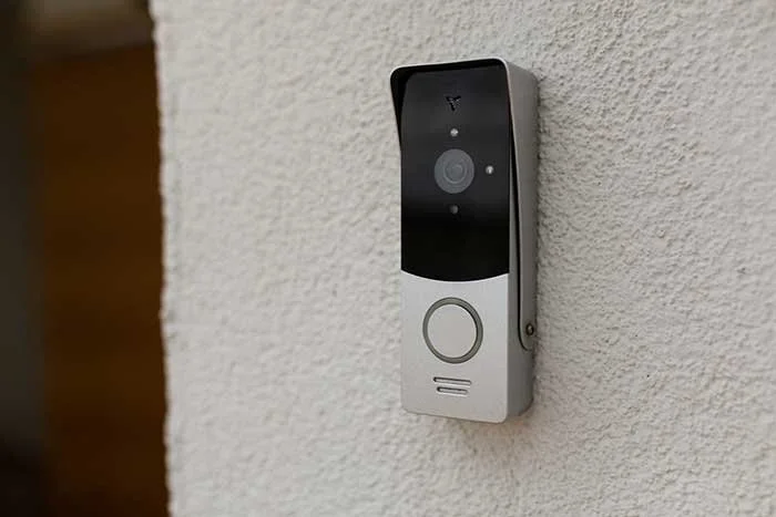 smart video doorbell on the wall