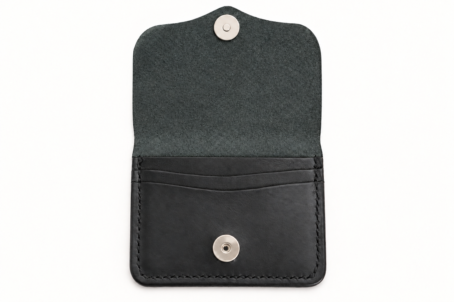 Polished silver snap on open black wallet-4.png