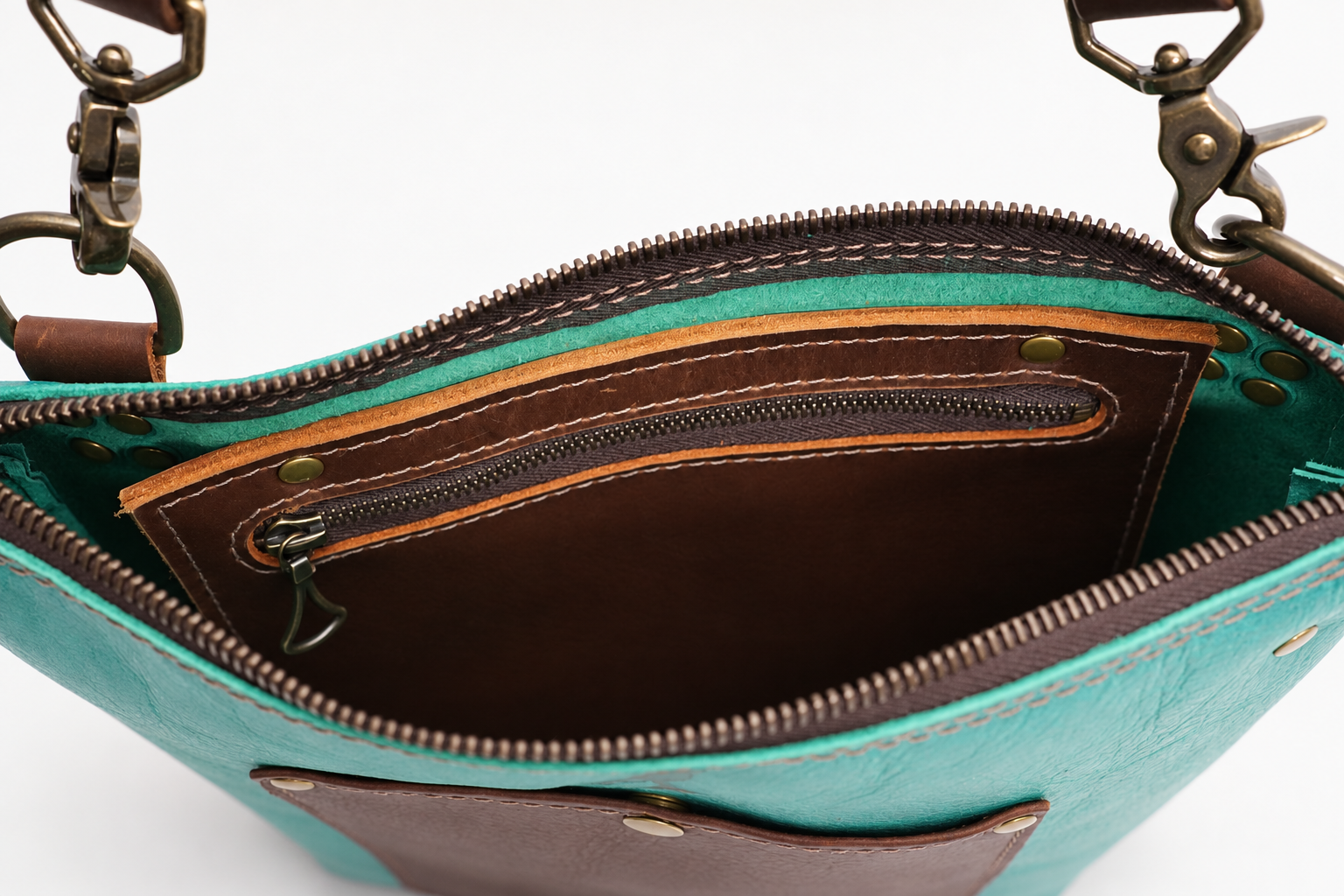 Teal Pinnacle crossbody bag interior-6.png