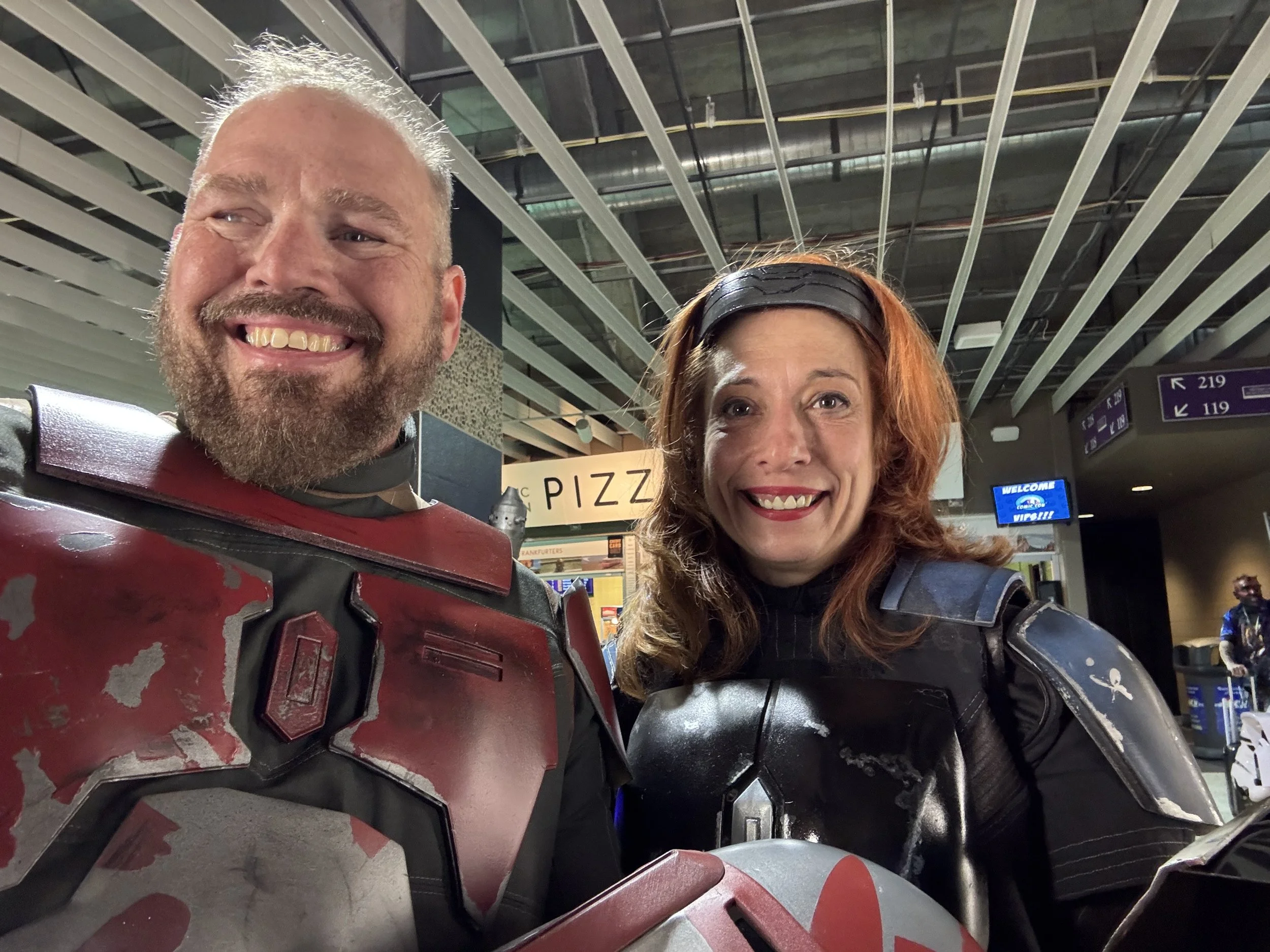 Todd Welch and Katie Strength wearing custom-built armor cosplay, demonstrating performance-ready costume design by OuterRim Creatives.