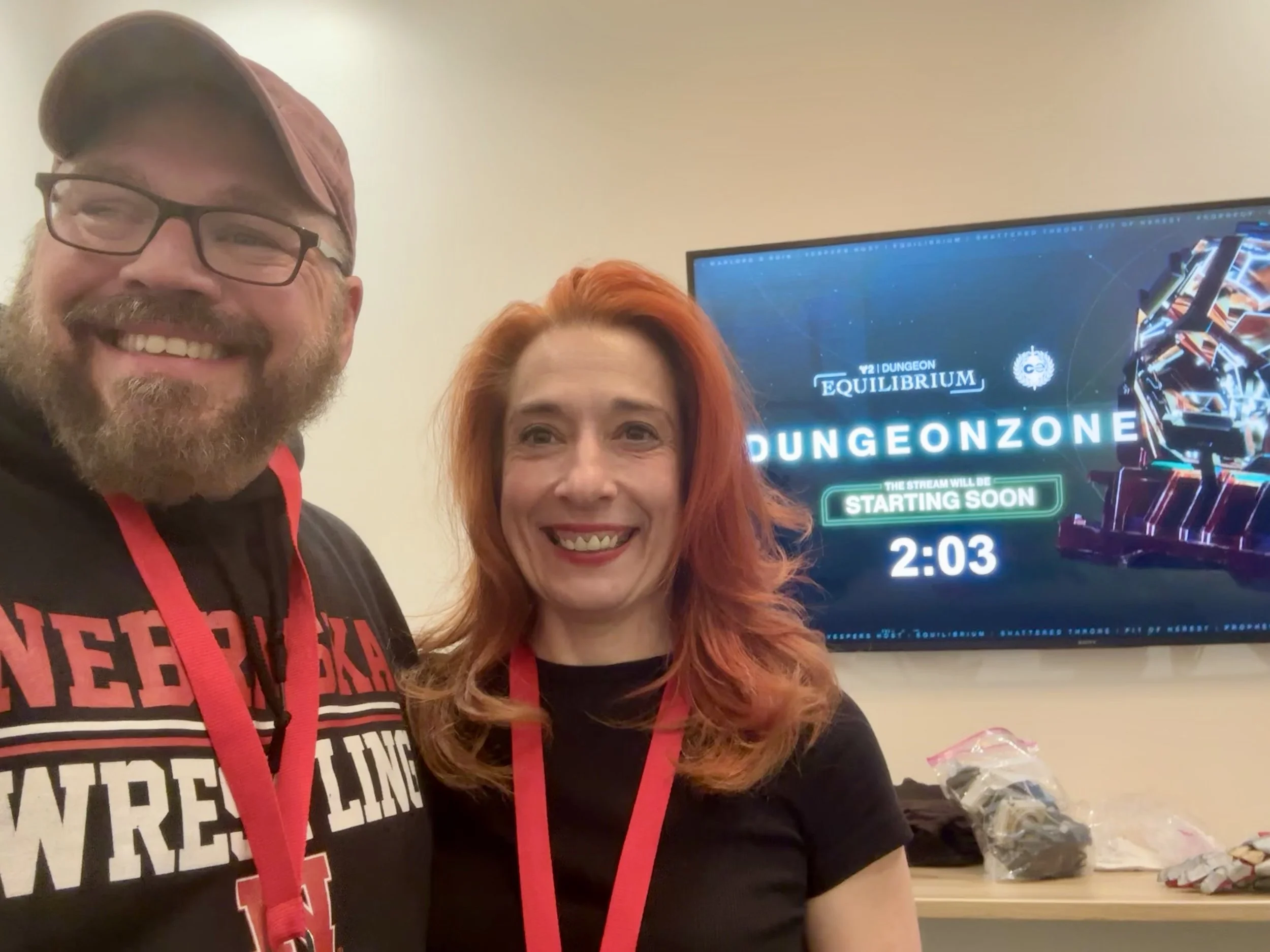 Todd Welch and Katie Strength at a cosplay convention, showcasing custom-built costumes and the creative partnership behind OuterRim Creatives.