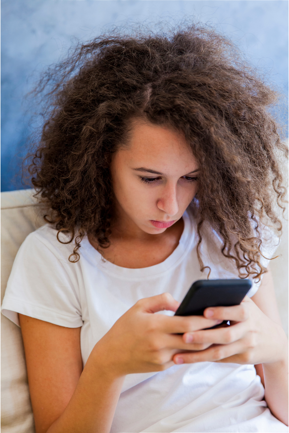 Sad girl on smartphone