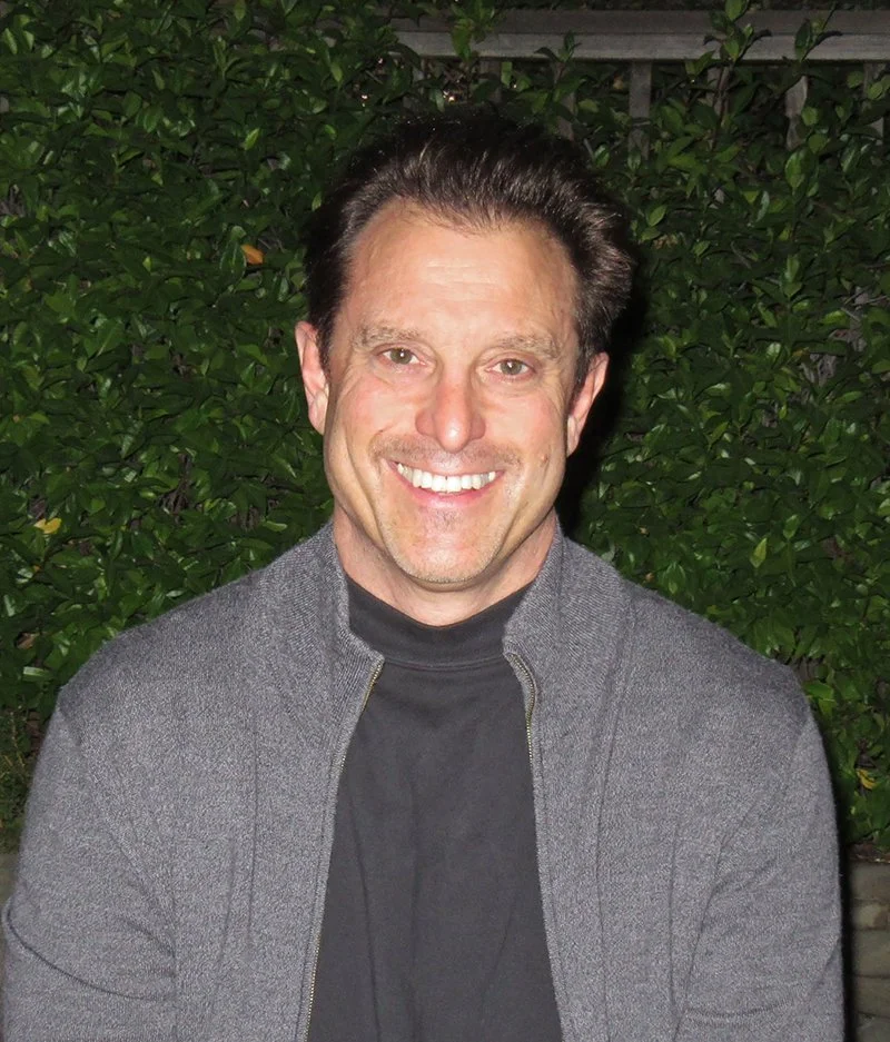 66a174bda9cdbd0fe8eca843_Richard Portrait Cropped.jpg