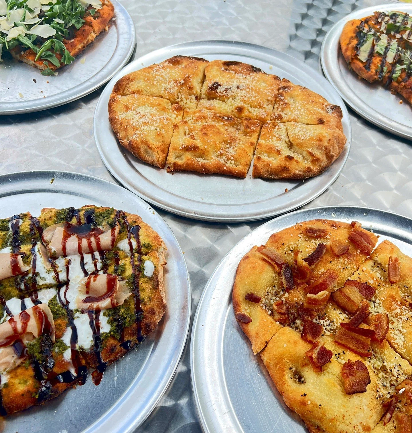 Pinsa isn't your average pizza. It's your new obsession. 
.
.
.
#LaPinsaLove #FoodieFavorites #MidtownStation #Ocala #FloridaFoodies #PizzaButBetter #PinsaPerfection #HappyHour