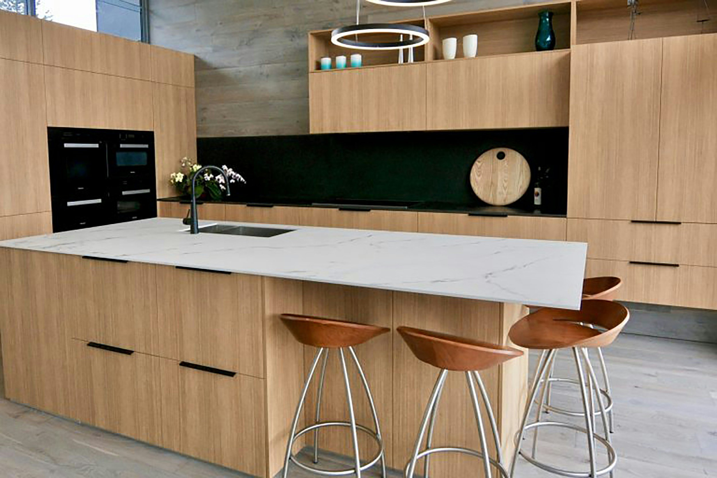 Can you recommend any specific materials that are both stylish and durable for kitchen cabinetry?