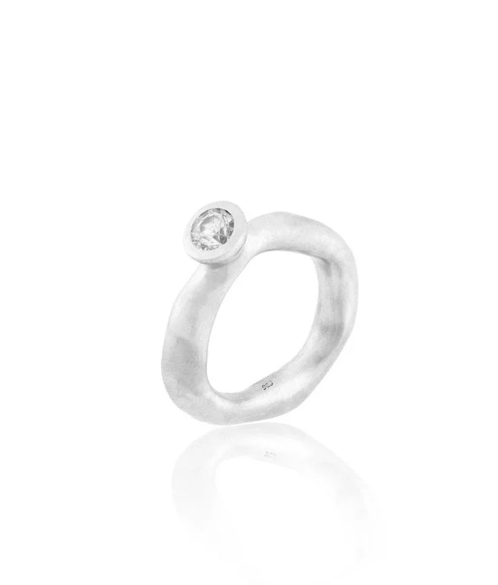 Aqua ring with a diamond set in a bezel setting.
Designed and made by @zardi.chiara in sterling silver
*
For inquiries and further details, DM or click the link in bio. Or come to find our jewellery @whatifberlin. Tue-Fri 15:30 - 19:30, Sat 11:00- 19