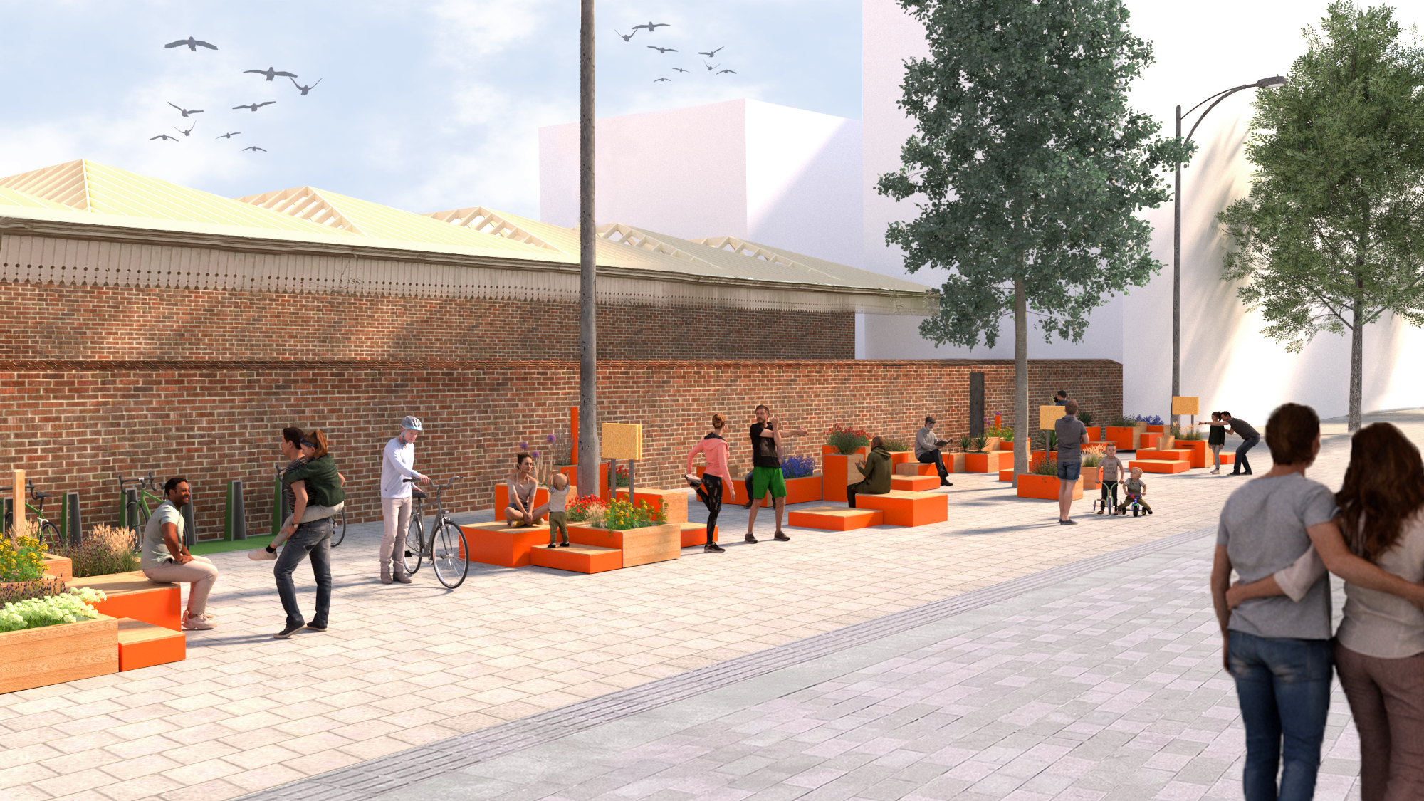 A lively outdoor urban space with people sitting, walking, and talking. There are orange benches with plants, a brick wall, trees, and a clear sky with birds flying.