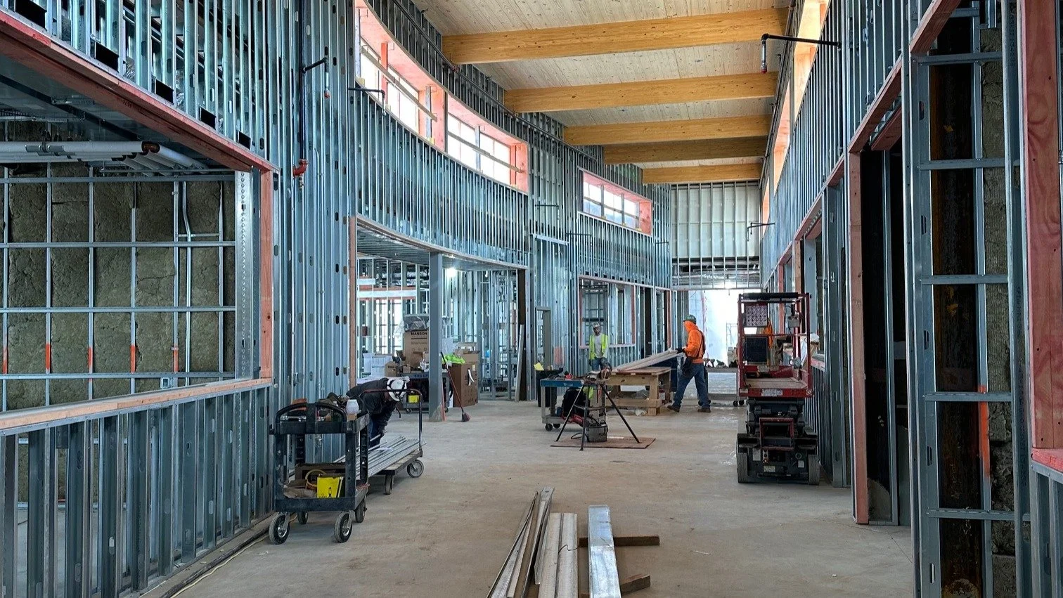 Things are taking shape in Skokie School District 68! Wood ceilings, a brick accent wall, and a softly curved corridor create a welcoming and warm environment for the young students attending this new Early Childhood Center. 

The addition, which is 