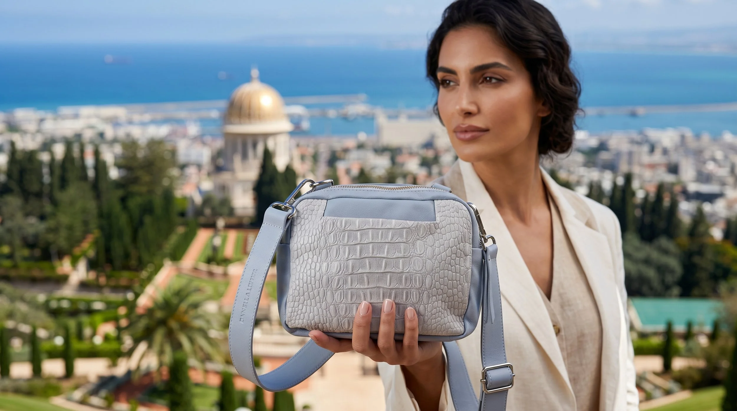 Model_holding_luxury_bag_Haifa_202607131643.jpeg