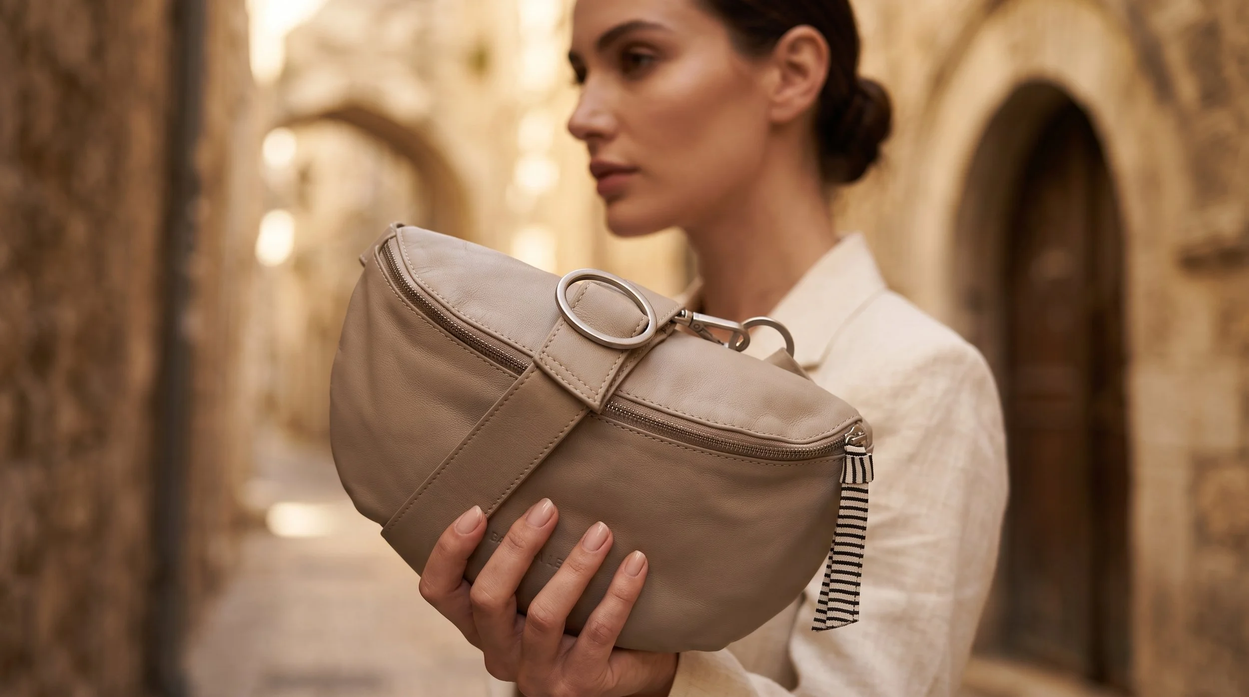 Model_holding_bag_in_Jerusalem_202607131644 (1).jpeg