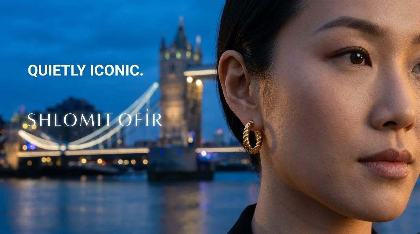 Woman_wearing_earring_by_bridge_202608231500.jpeg
