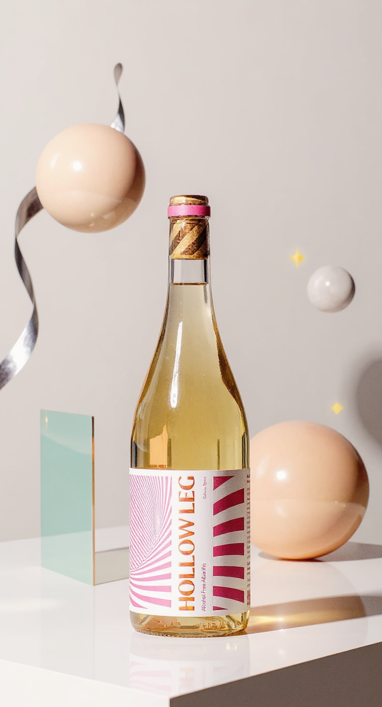 freepik__the-wine-bottle-sits-prominently-in-the-foreground__36064.png