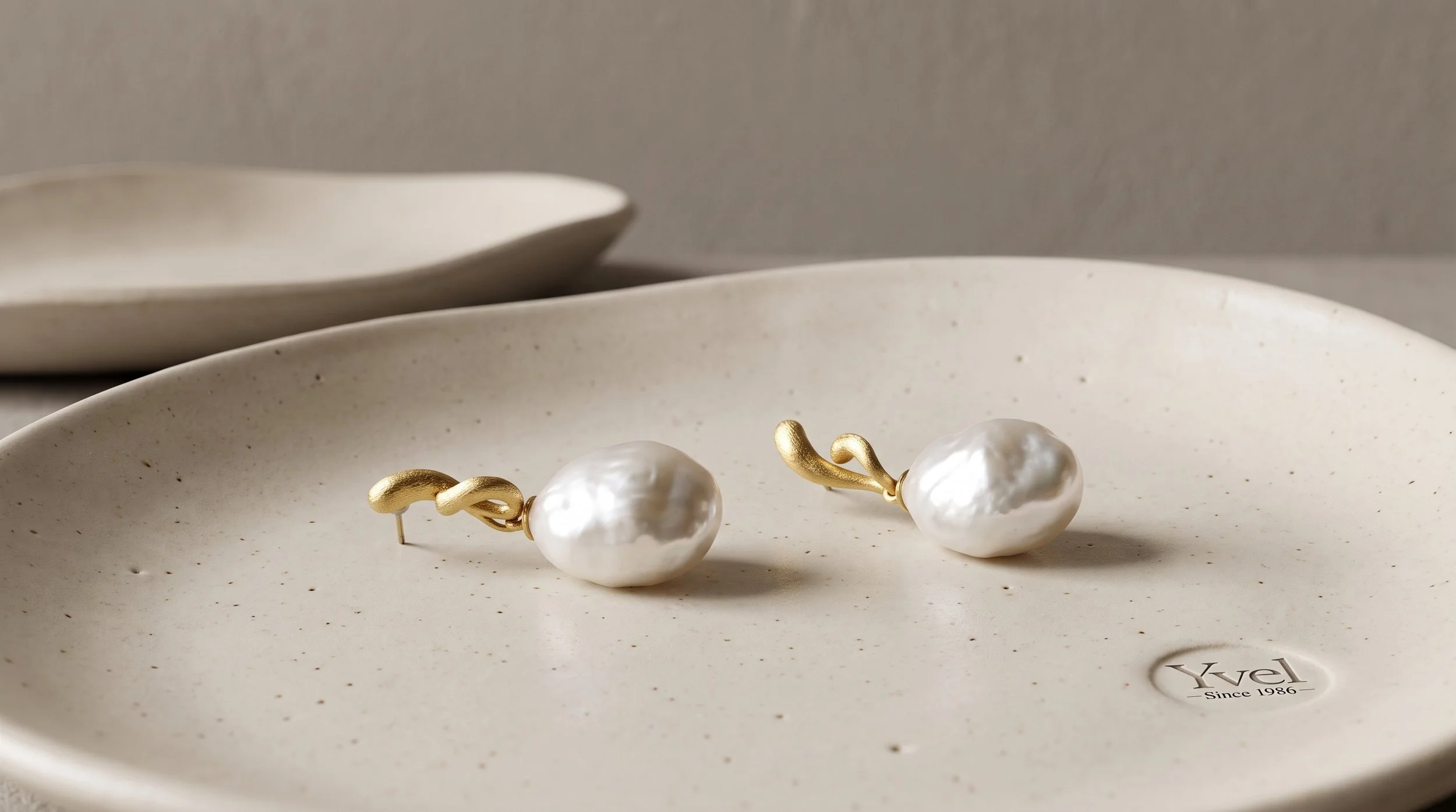 Earrings_displayed_on_ceramic_plate_202608201302.jpeg