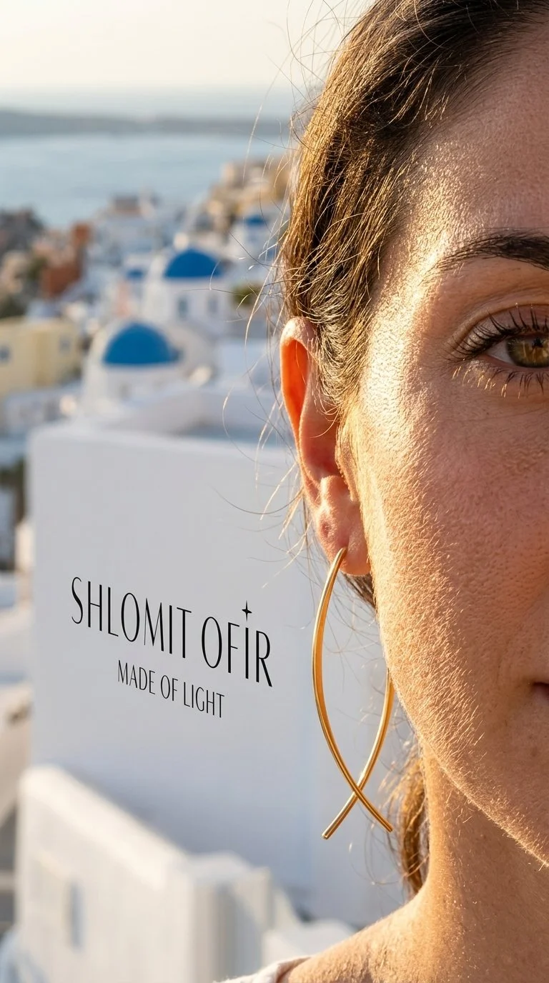 Woman_wearing_earring_in_Santorini_202608231459 (1).jpeg