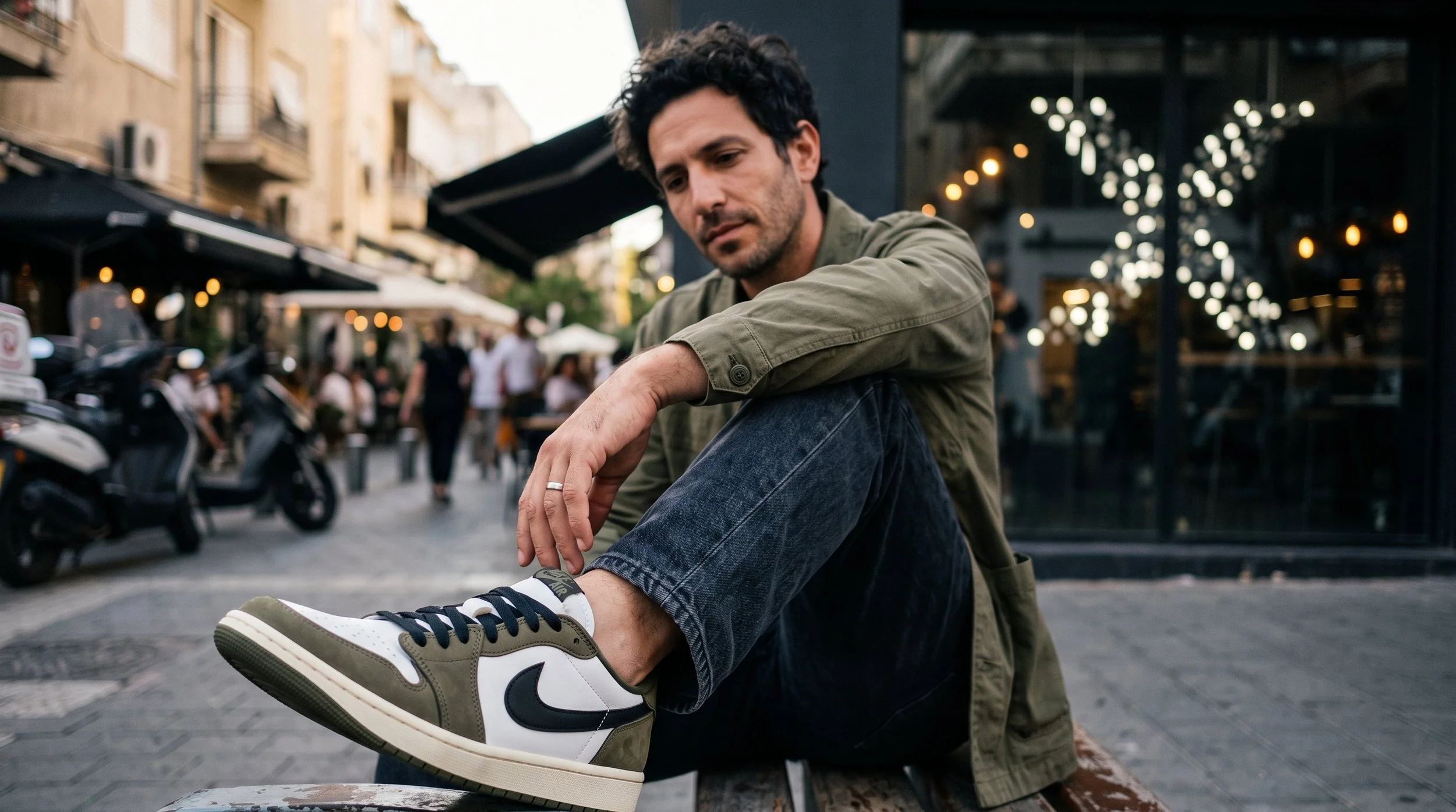 Man_sitting_on_city_bench_202608181117.jpeg