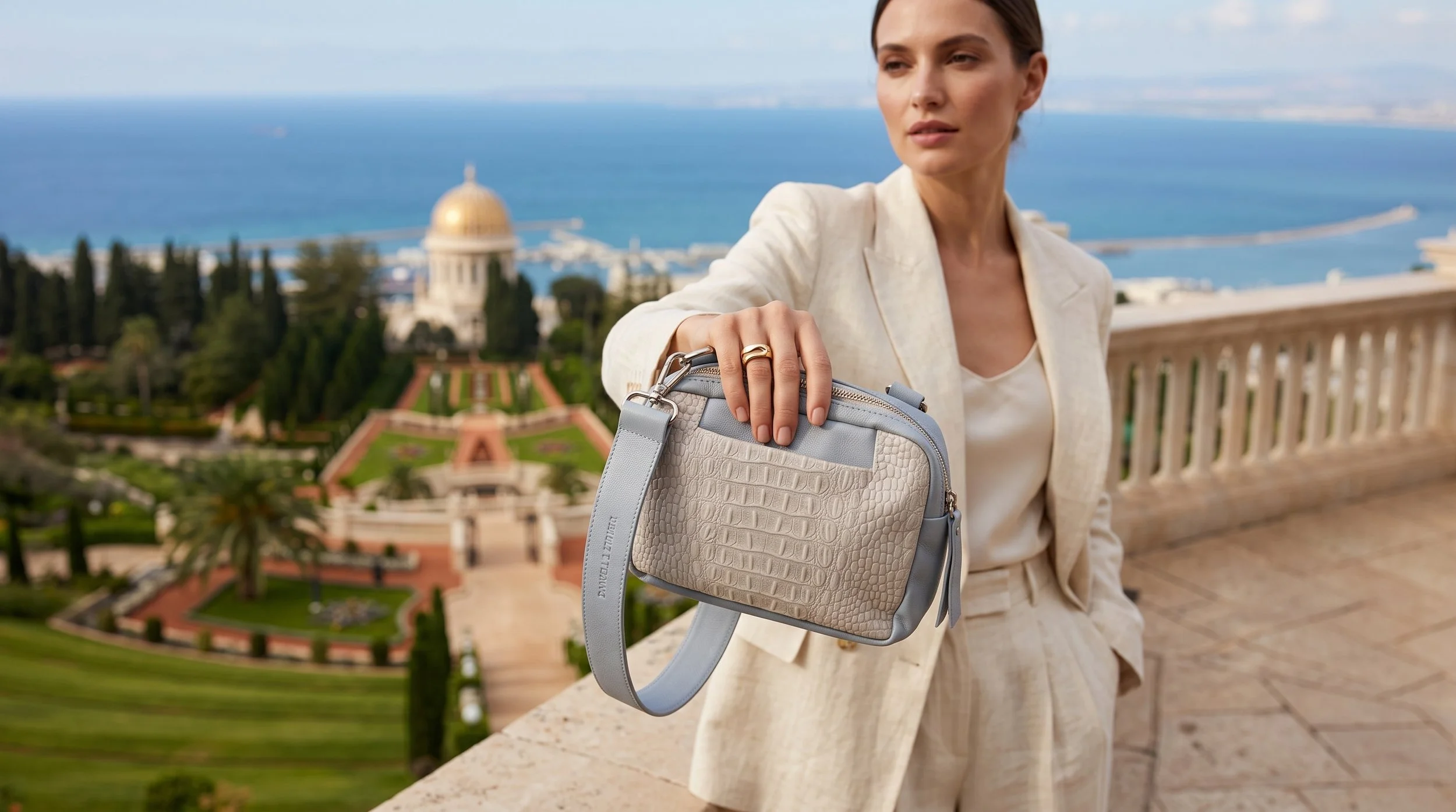 Model_holding_luxury_bag_Haifa_202607131643 (1).jpeg