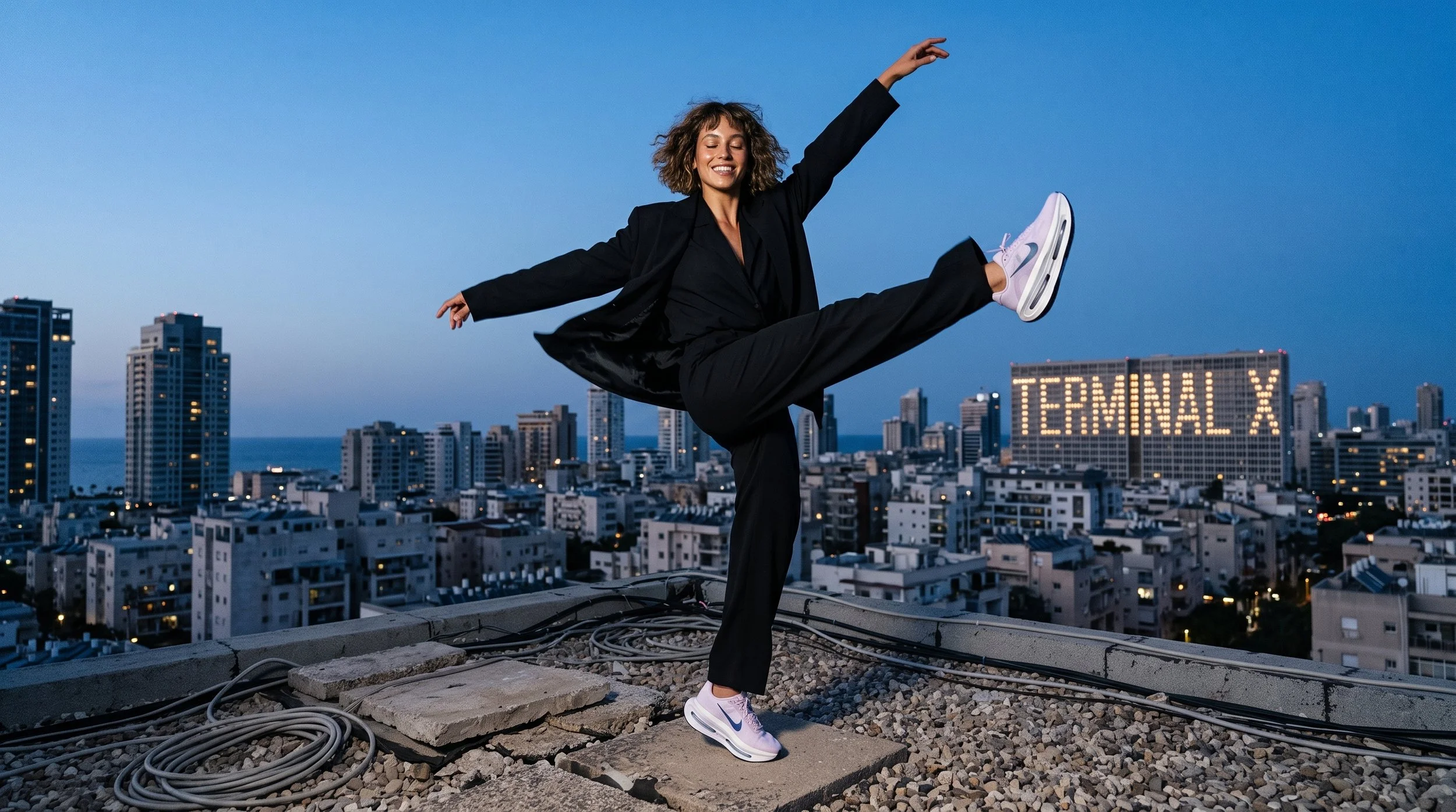Woman_dancing_on_rooftop_2K_202608181119 (1).jpeg