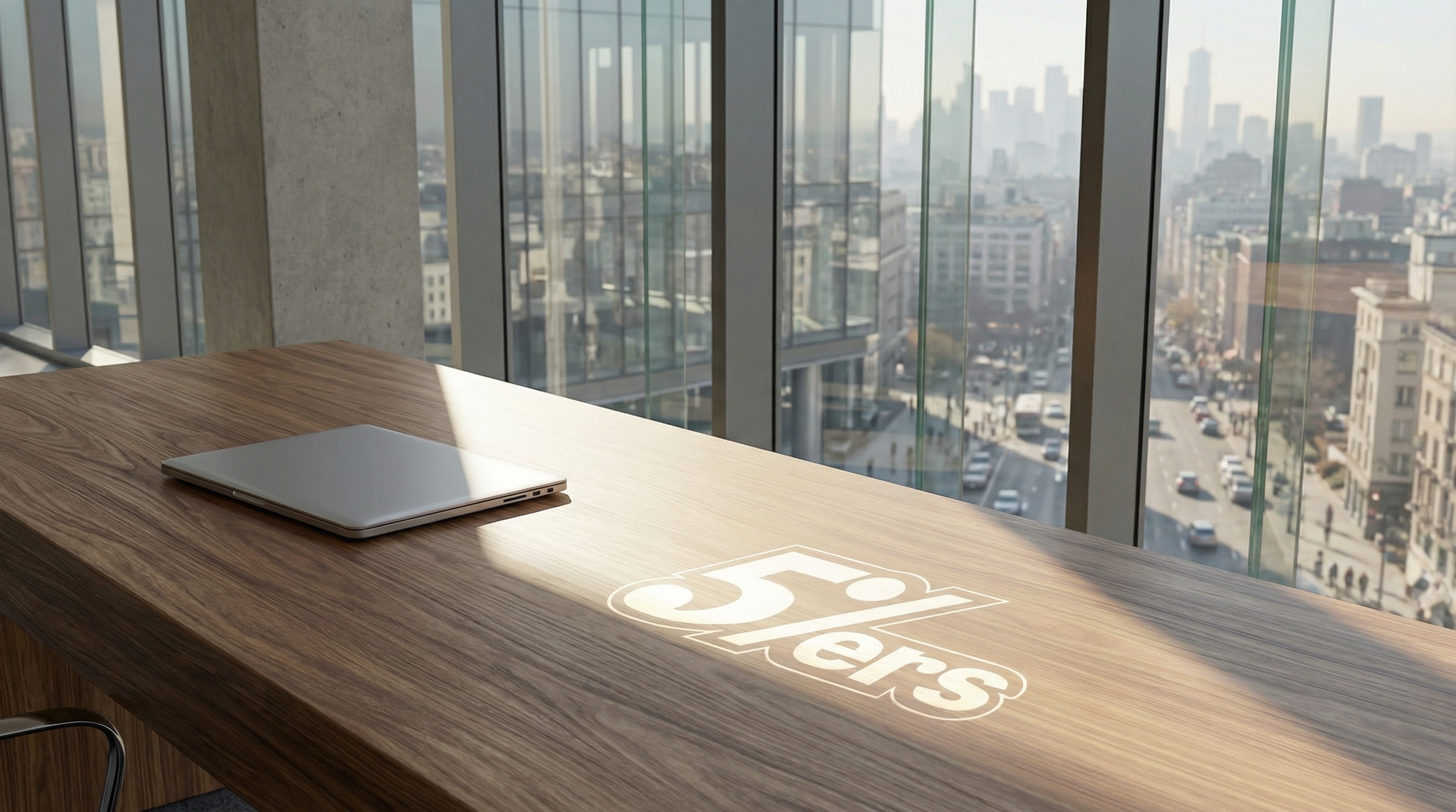 freepik__foreground-empty-modern-office-desk-laptop-closed-__77443.png