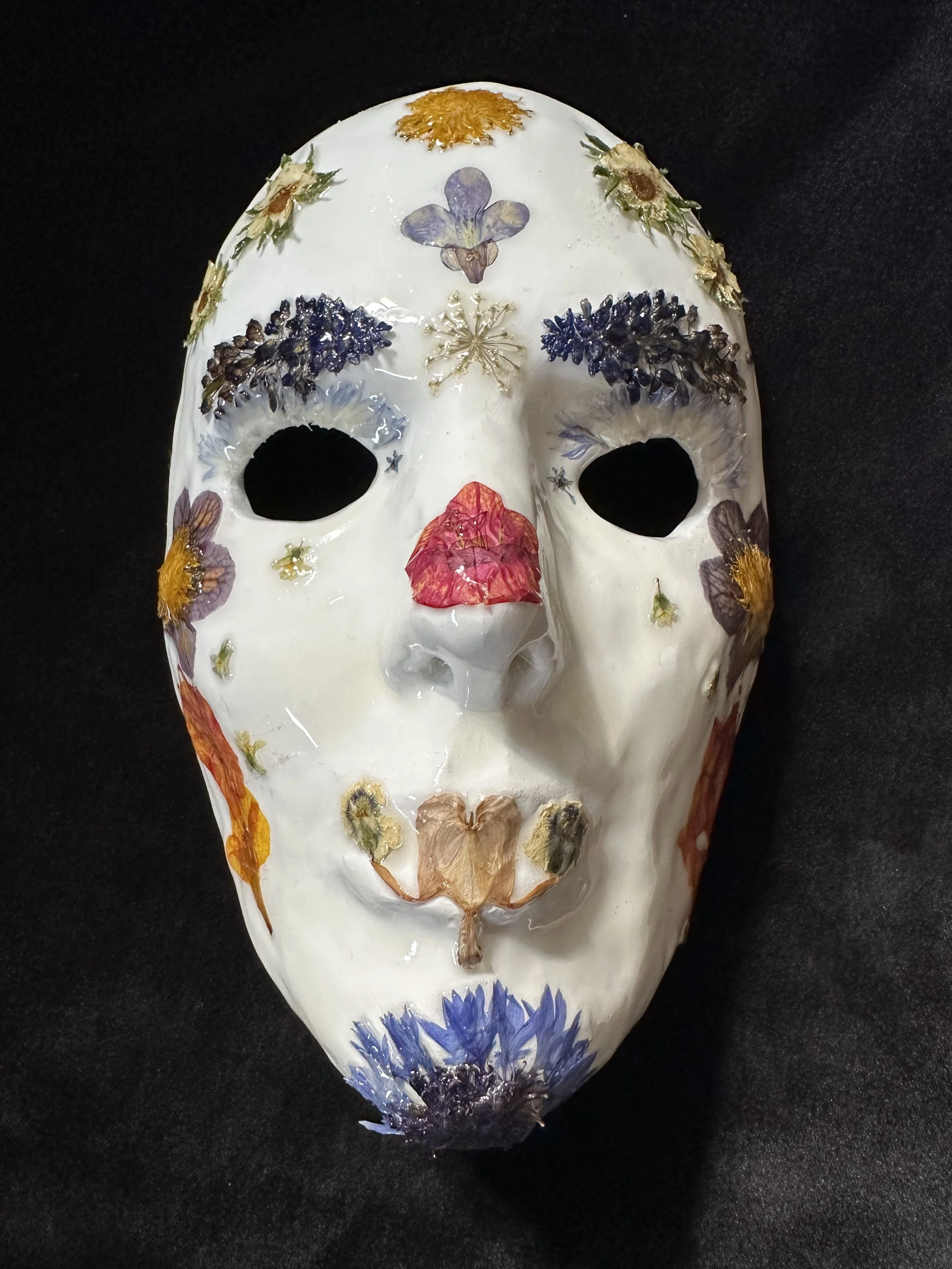 "Floriferous Light", Laura Nelsen, papier-mâché clay, pressed flowers and acrylic paint, 8"x5"x3.5", 2025. [SOLD]