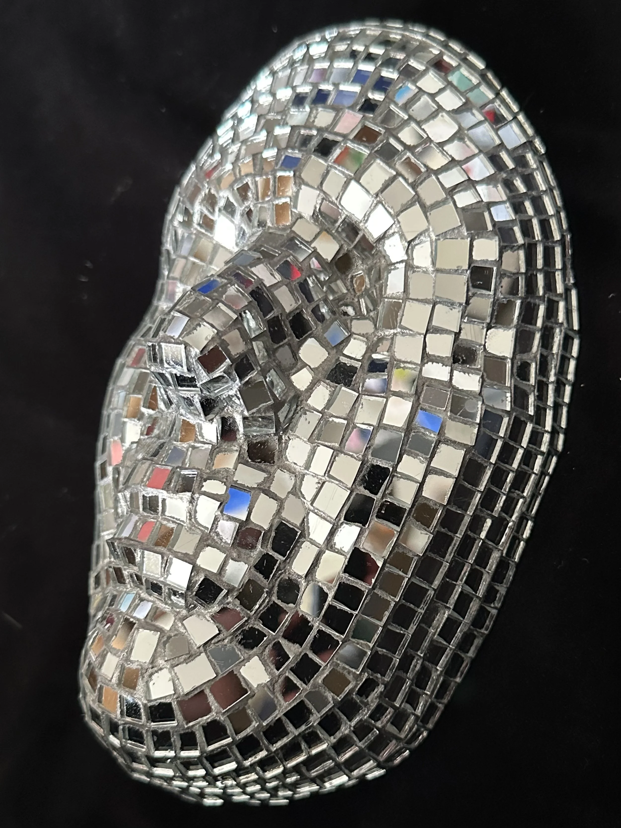 "Reflections", Laura Nelsen, papier-mâché clay, mirrors and acrylic paint, 8.5"x5.5"3.5", 2025. [SOLD]